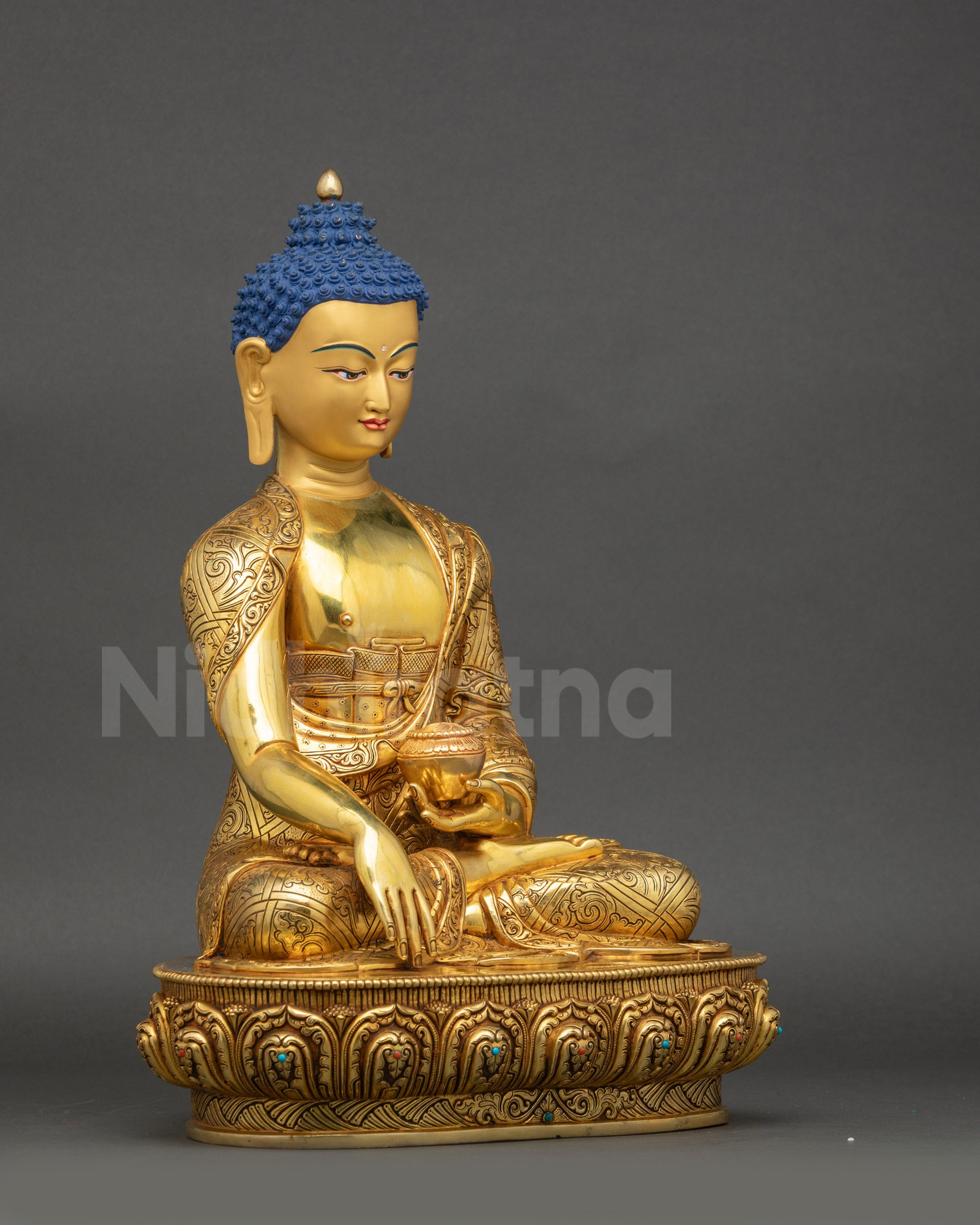 Right side view of Shakyamuni Buddha sculpture on lotus seat