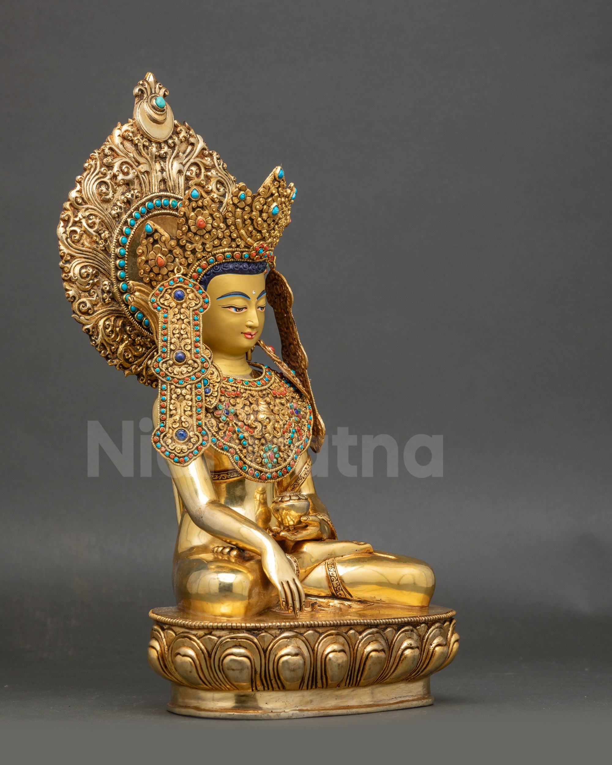 Right side view of handcrafted Jowo Shakyamuni Buddha sculpture with traditional motifs