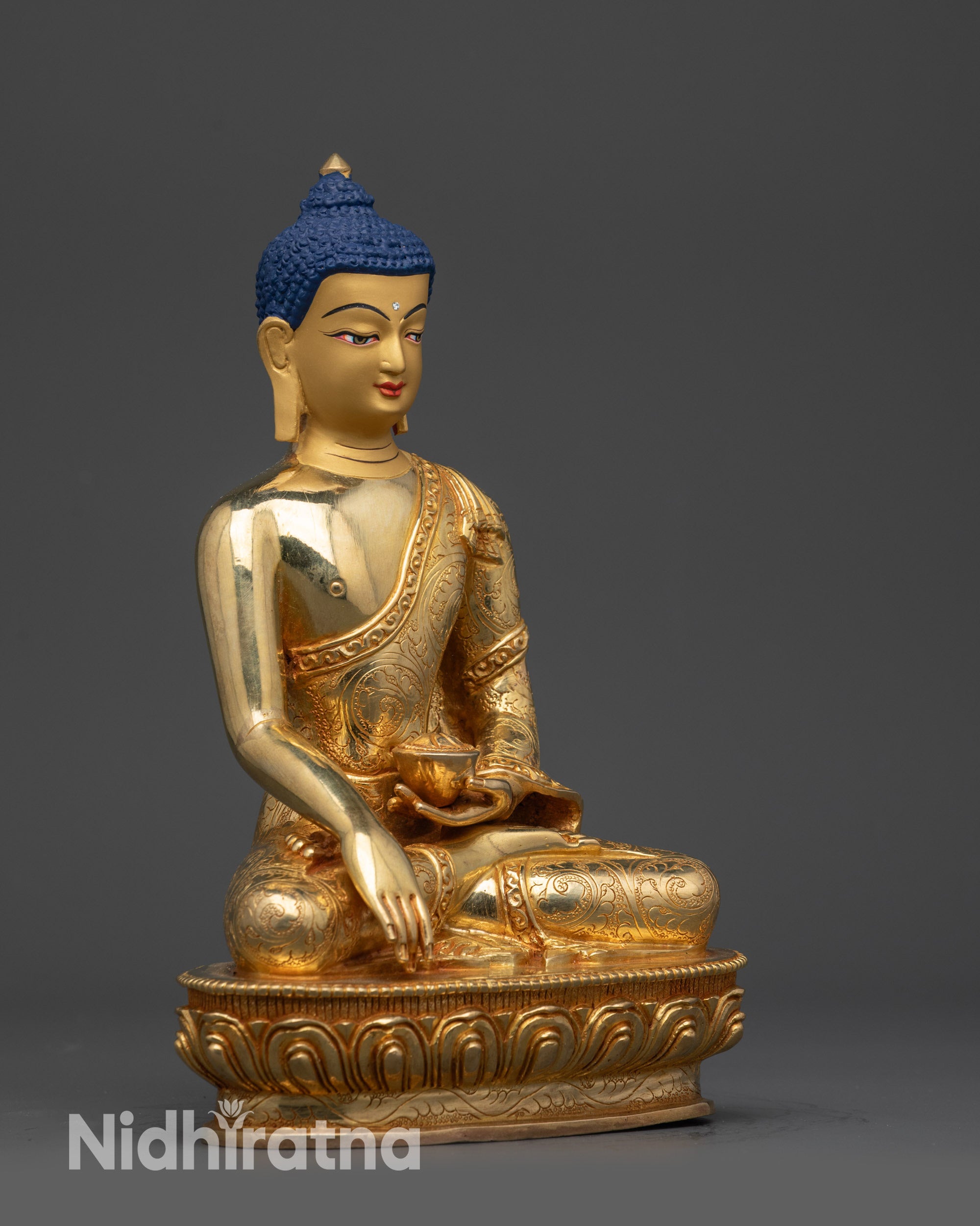 Right side view of the Buddha statue showing the patra bowl and mudra.