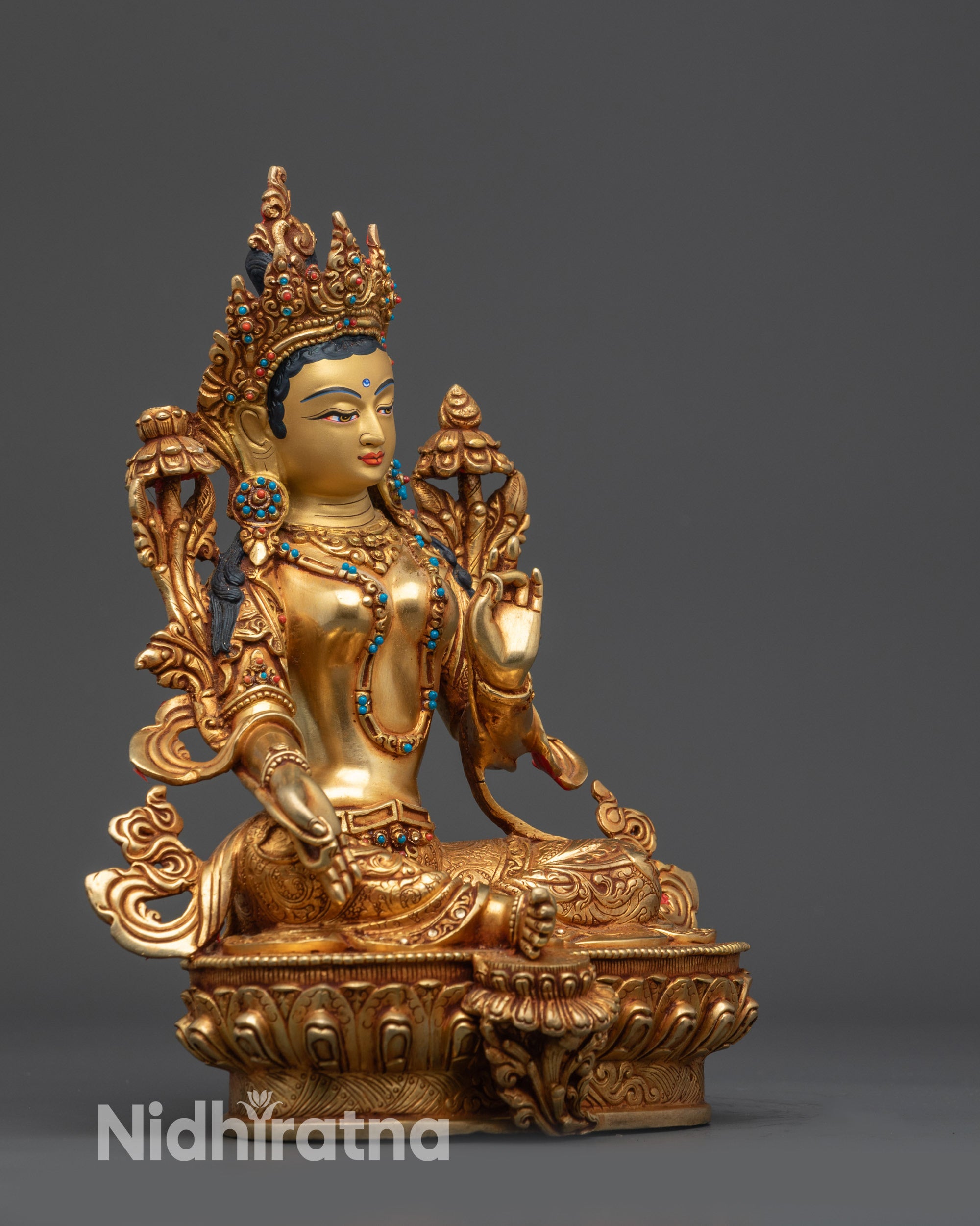 Right view side Green Tara showing lotus seat, semi-precious stones, and divine halo