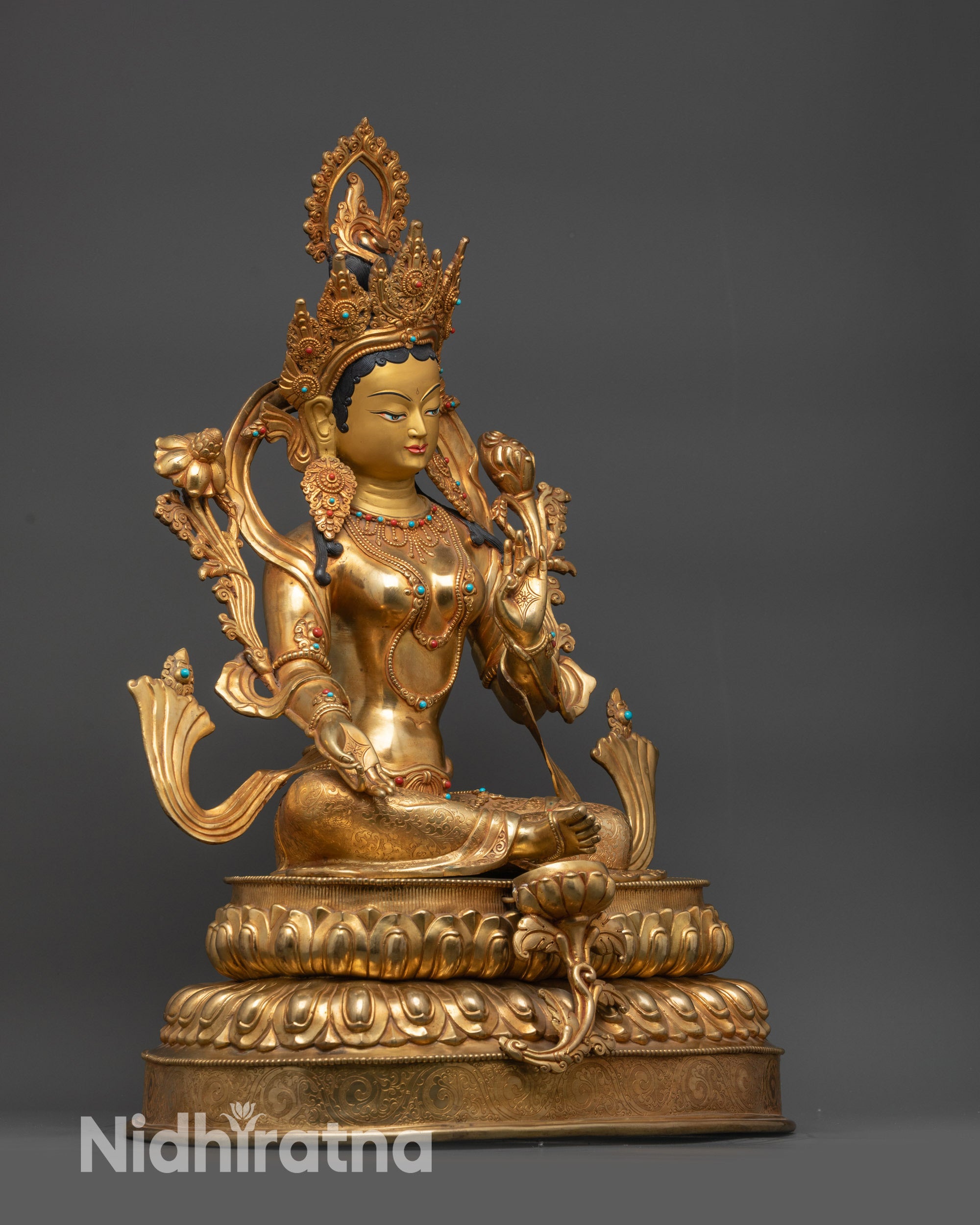 Right view side Green Tara statue royal ease pose right hand in Varada Mudra gesture