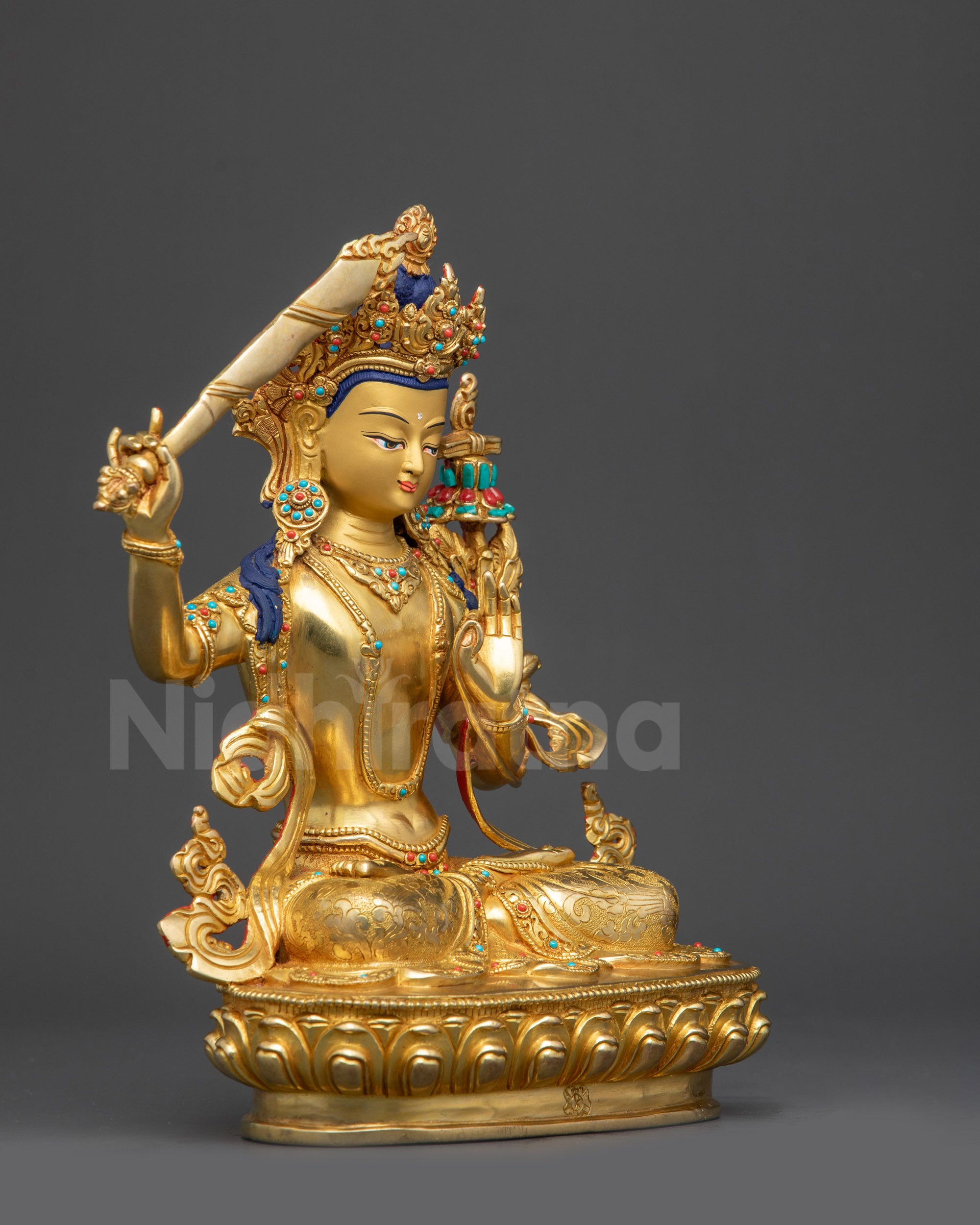 Right view side Manjushri Statue highlighting lotus seat and flowing ornate garments