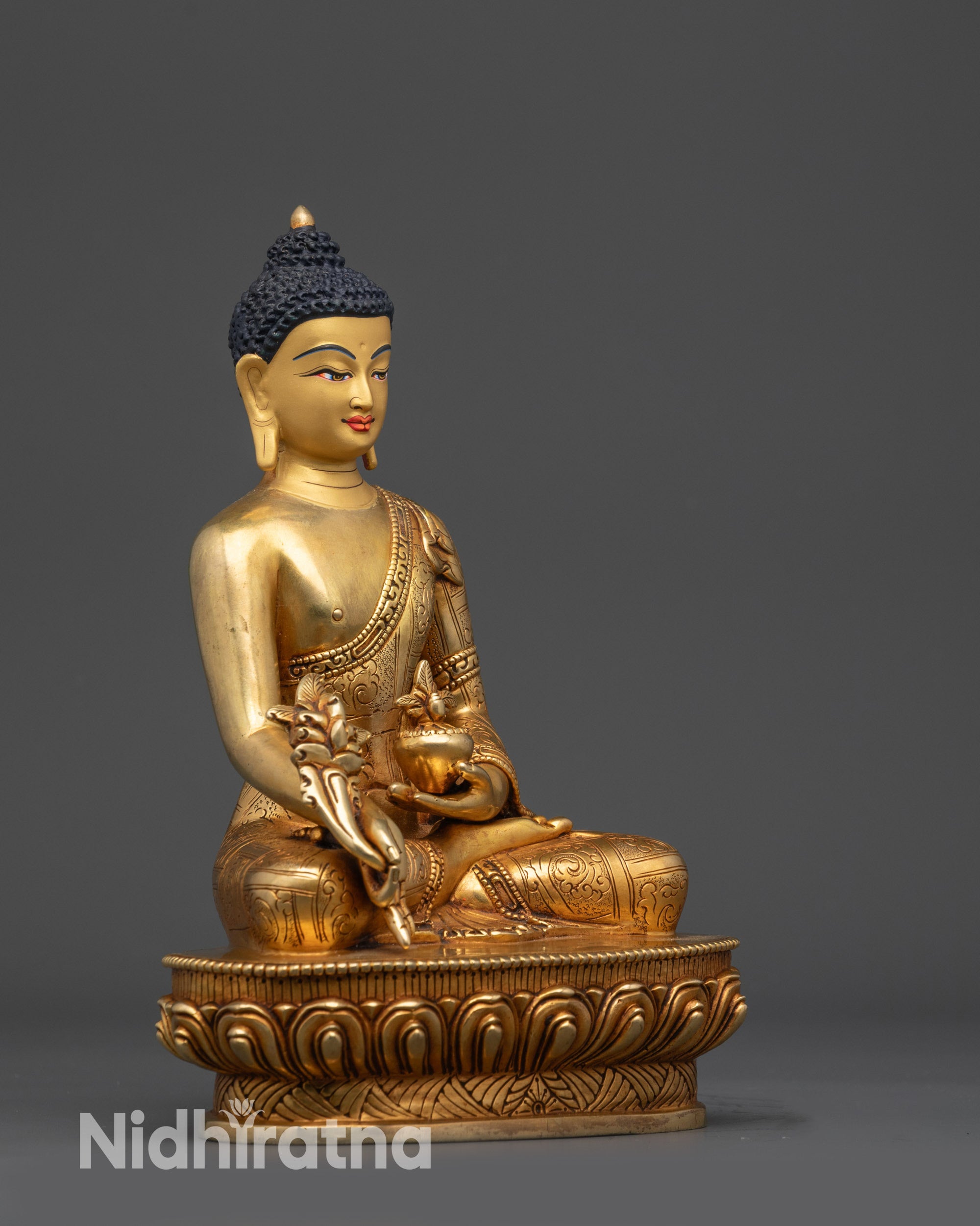 Right view side of Bhaisajyaguru Medicine Buddha statue with lotus seat and intricate robe