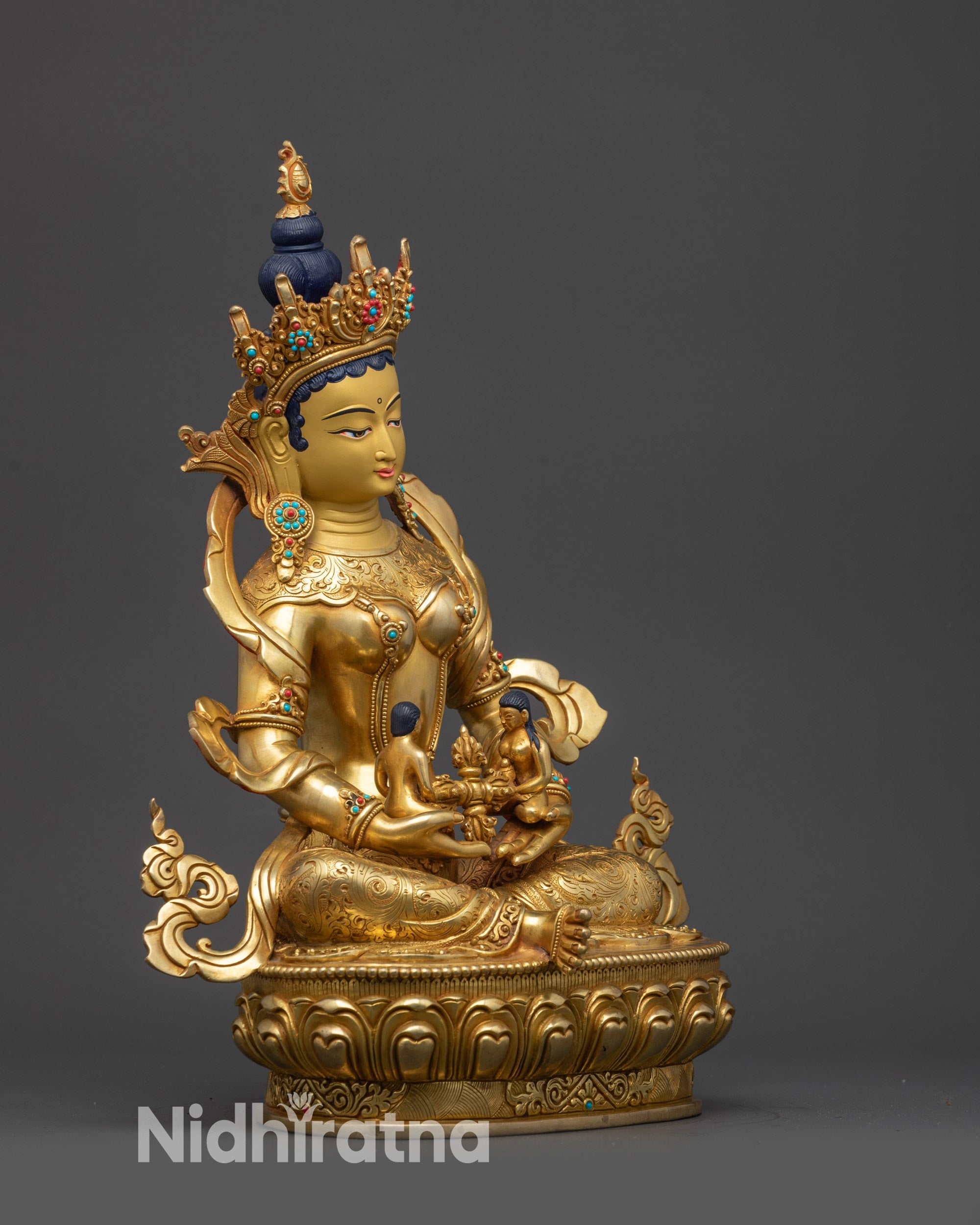 Right view side of Green Tara Statue, holding Vishva Vajra, crafted by master artisans