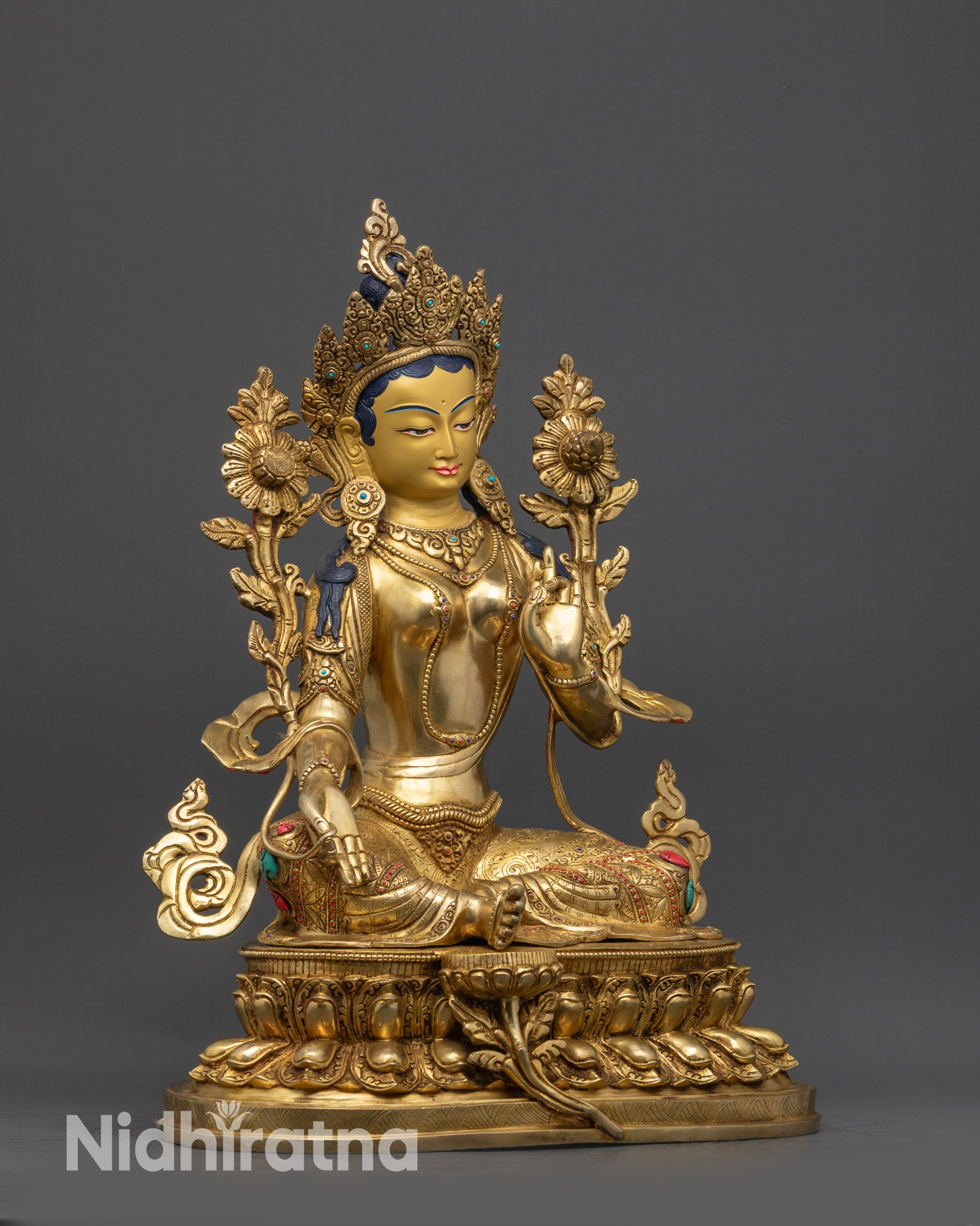 Right view side of Green Tara Statue seated on double-lotus pedestal with ornate carvings