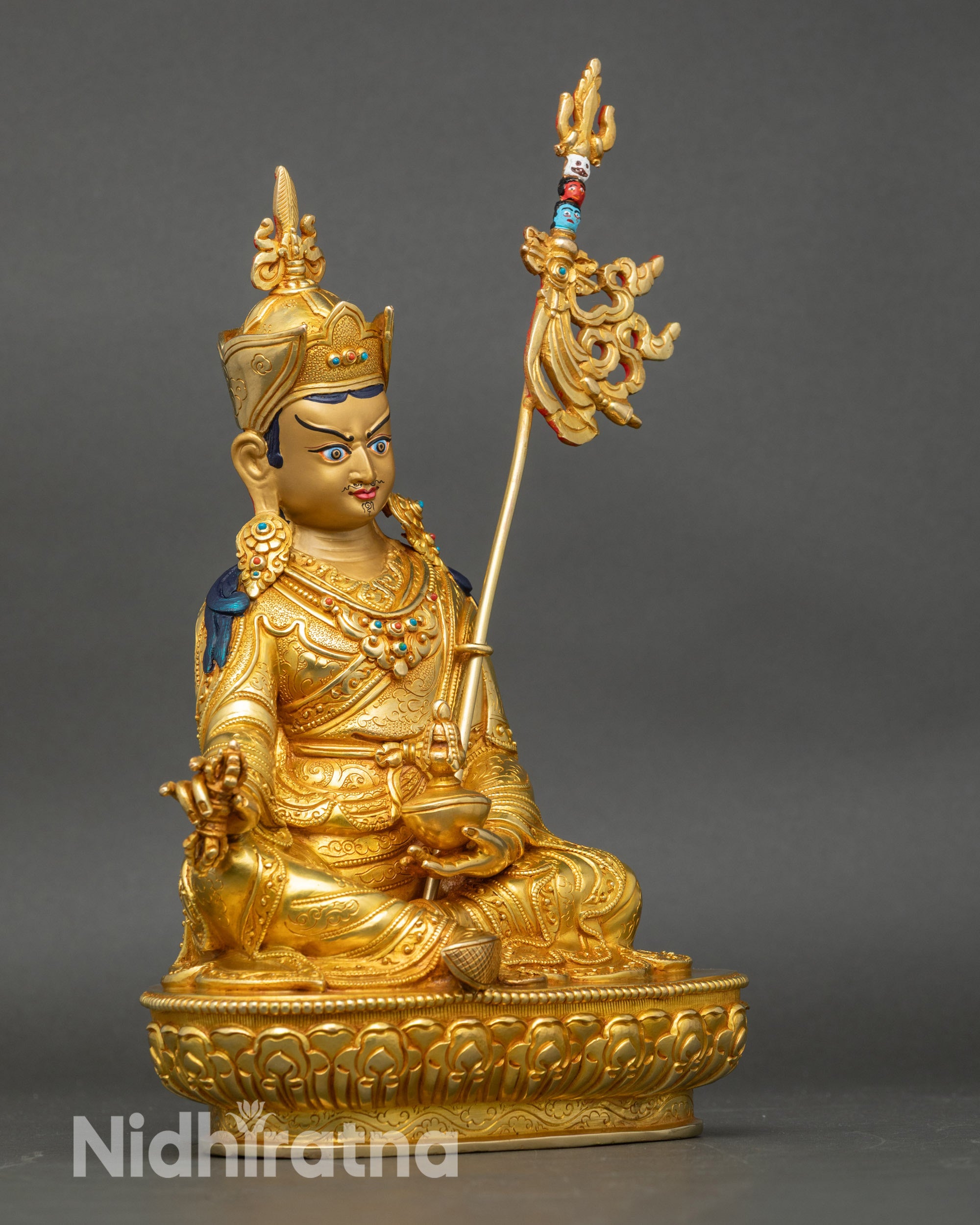 Right view side of Guru Padmasambhava sculpture with lotus seat and gold finish