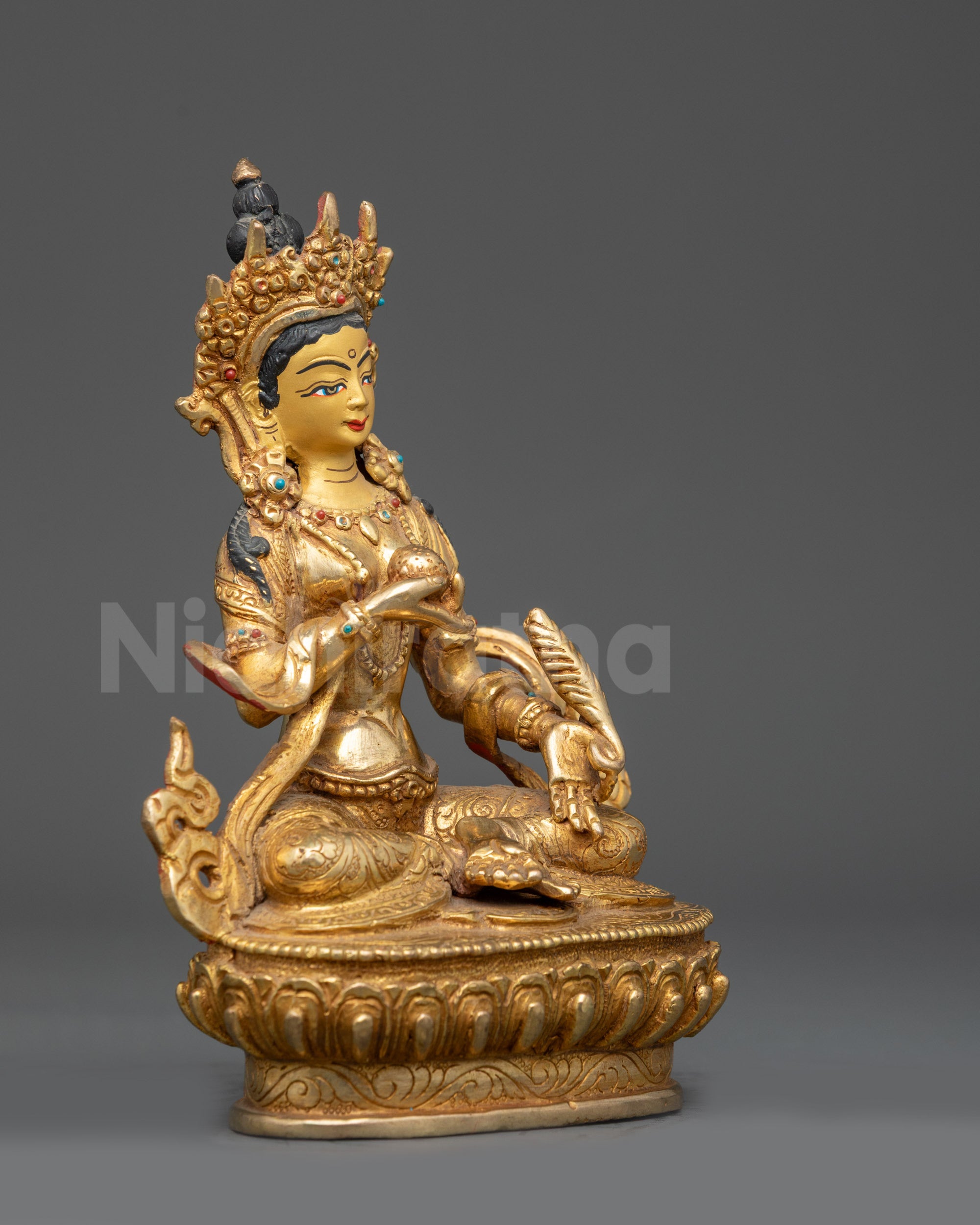 Right view side of Kshitigarbha Bodhisattva statue with lotus pose and intricate details