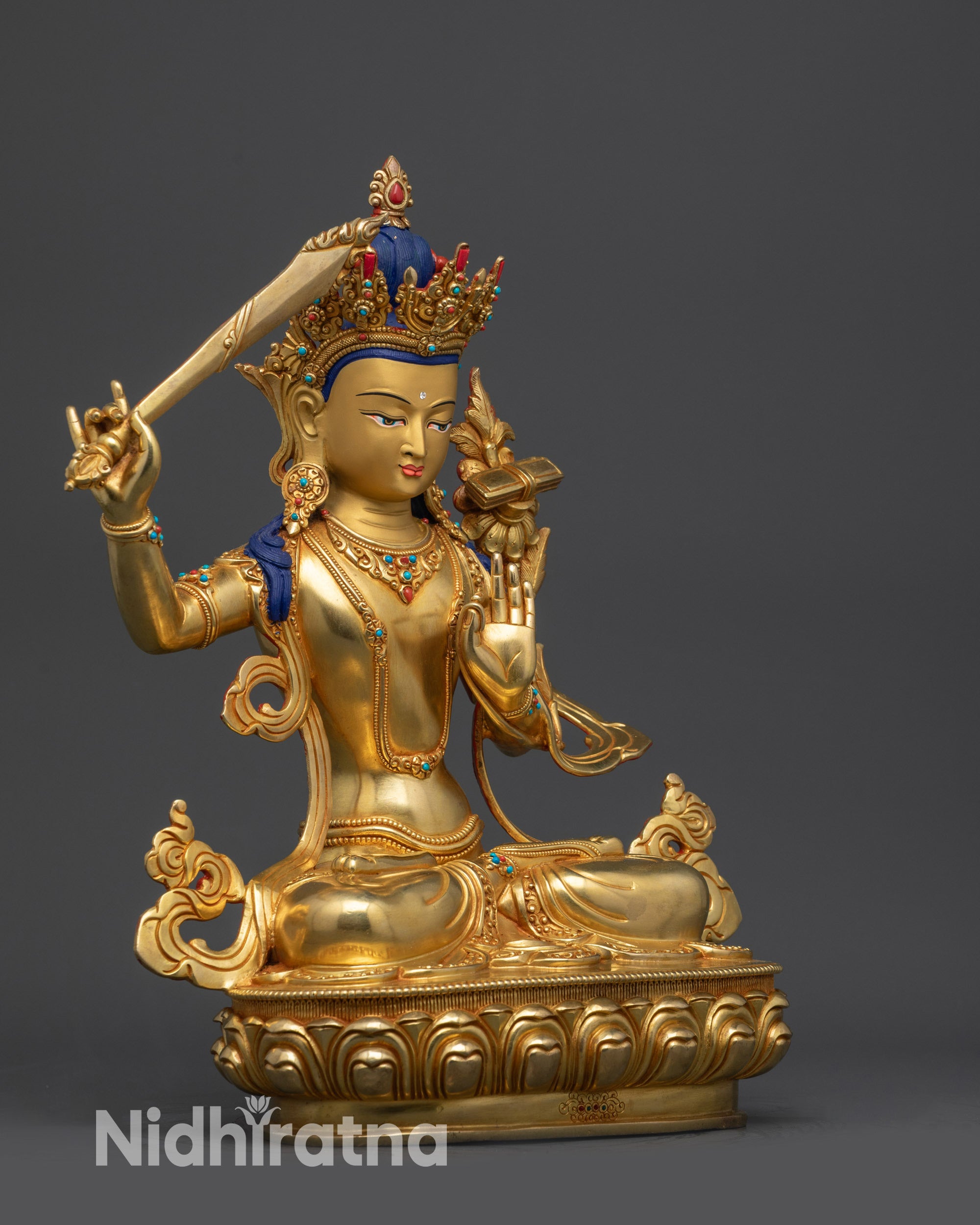 Right view side of Manjushri Bodhisattva statue with lotus pedestal and intricate patterns