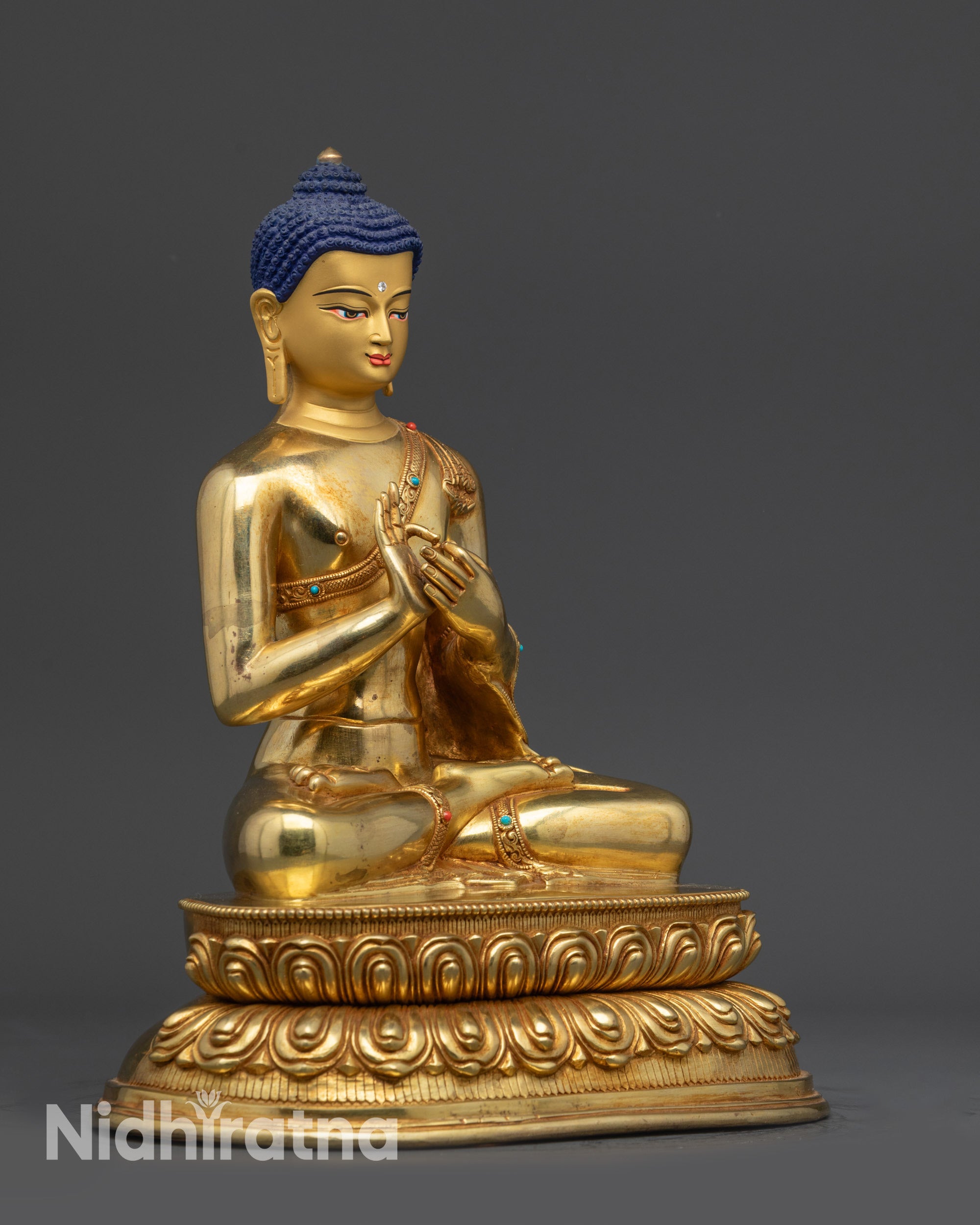 Right view side of Suvarnabhadra Vimala Buddha statue highlighting lotus seat and robe
