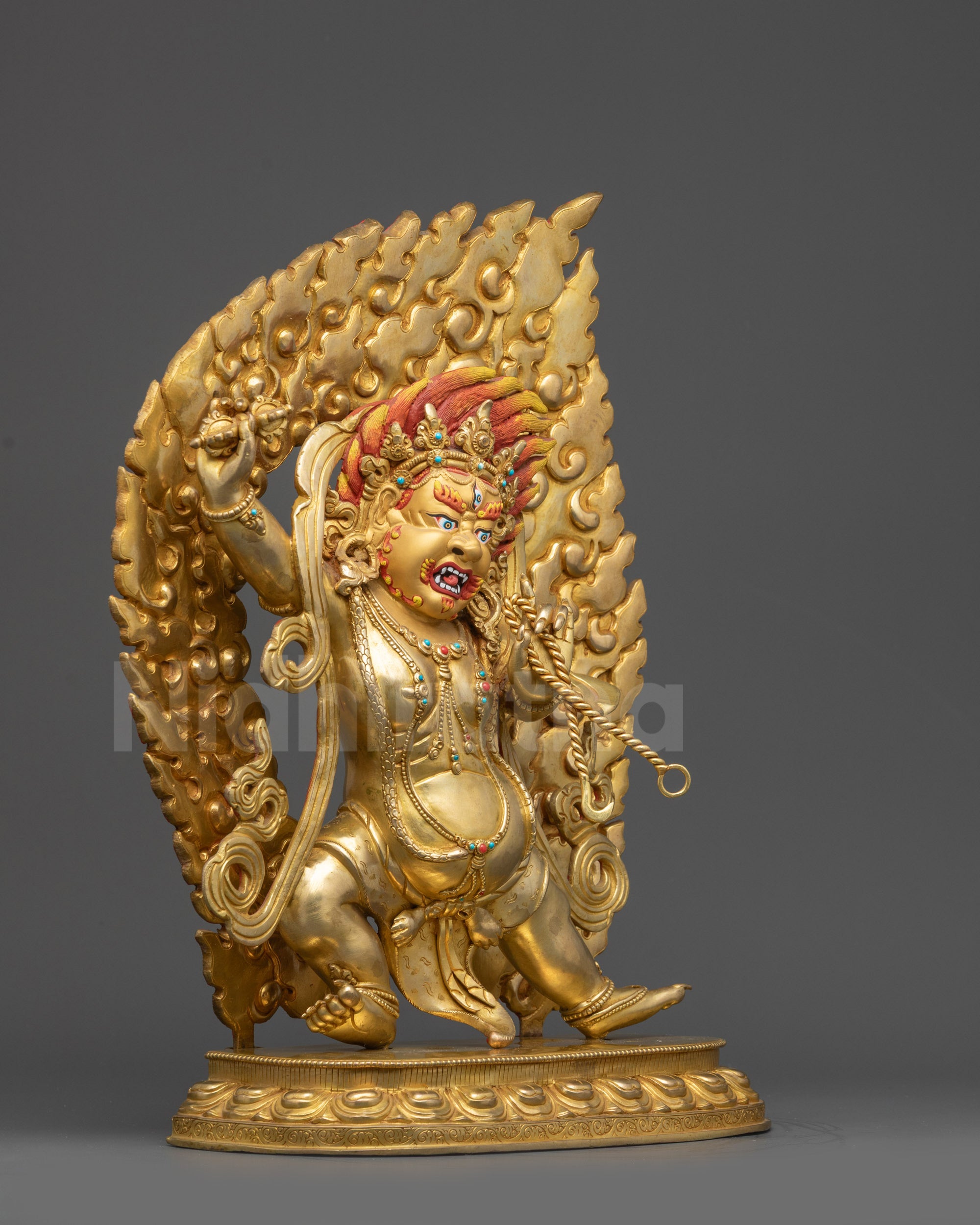 Right view side of Vajrapani holding vajra, showing dynamic dancing posture