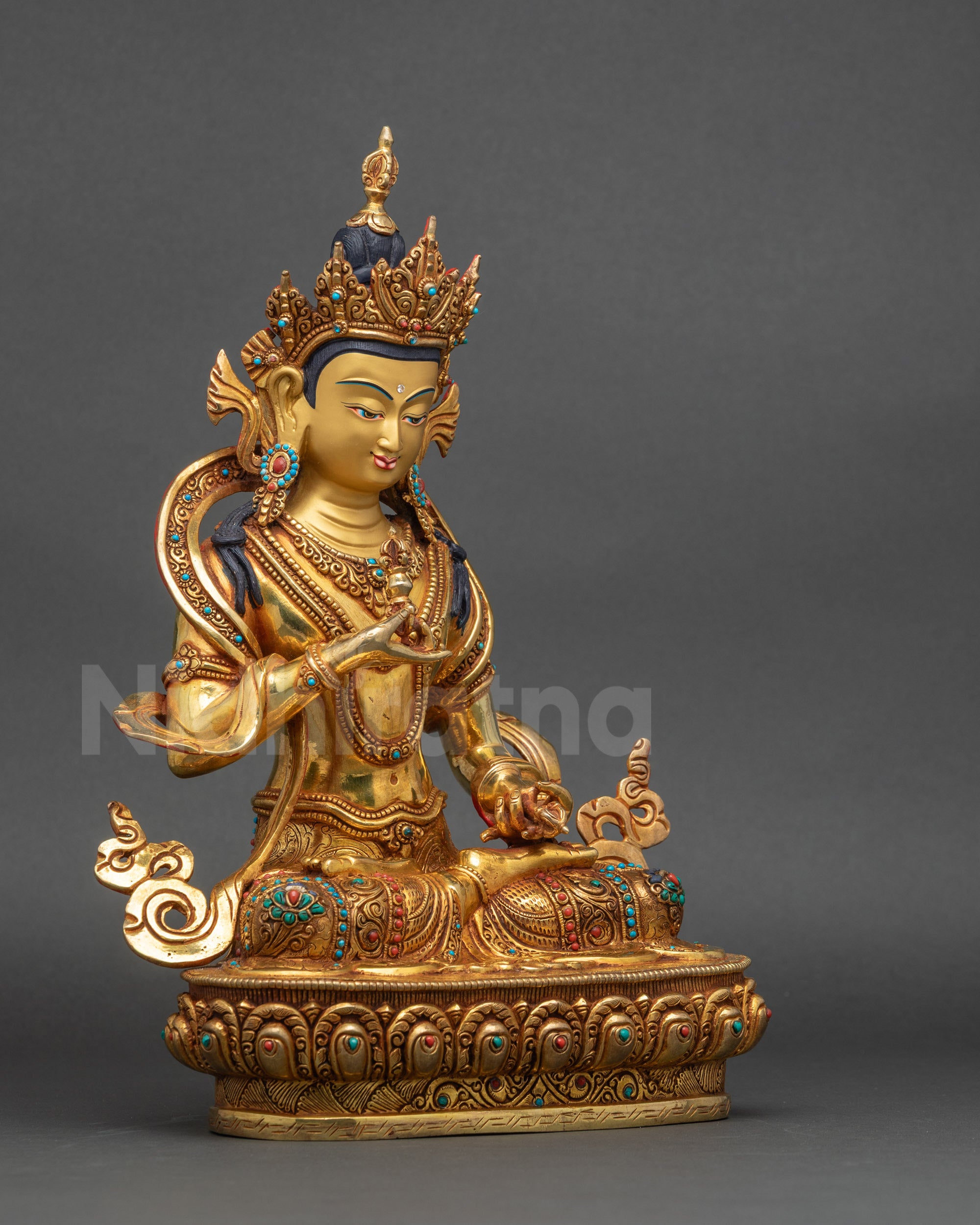 Right view side of Vajrasattva Statue with flowing robe and patterned stone embellishments