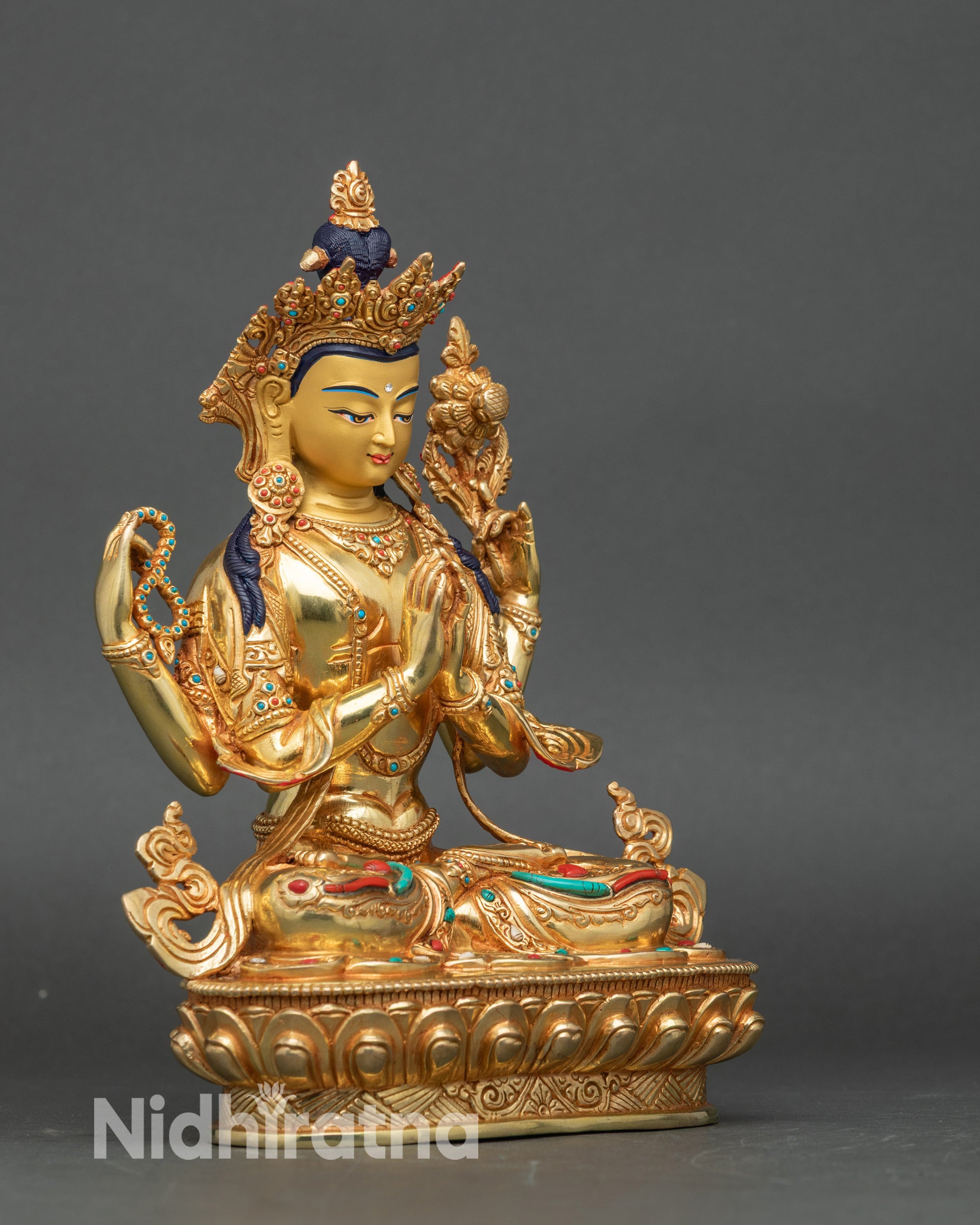 Right view with crystal mala in upper hand and detailed lotus base