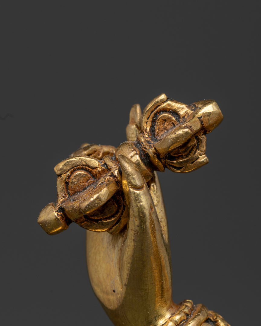 vajrapani statue's right hand holding vajra | Gold-plated Vajrapani statues