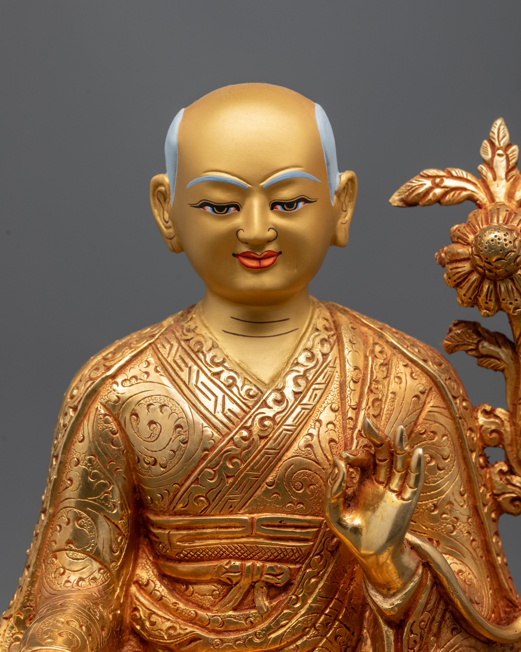 Sachen Kunga Nyingpo statue making the gesture of reasoning.
