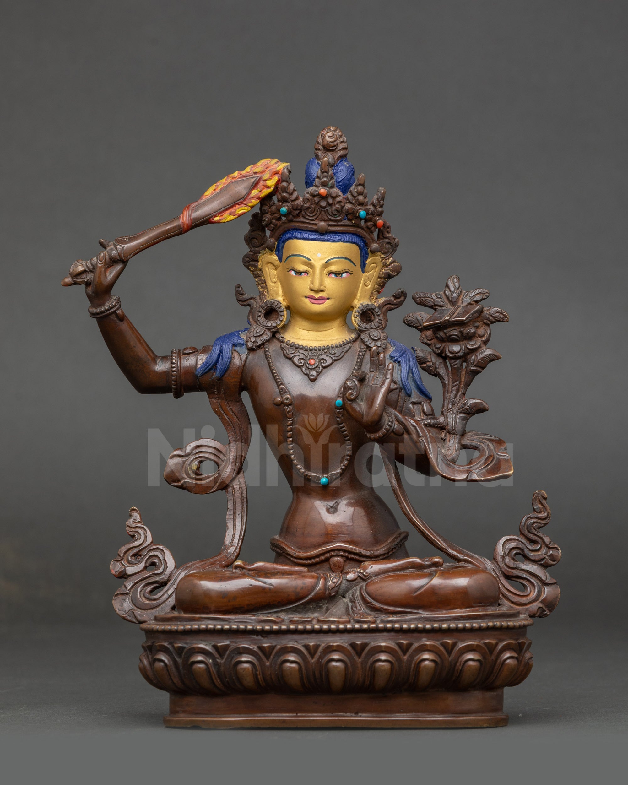Sacred Manjushri Statue oxidized copper with wisdom sword front view