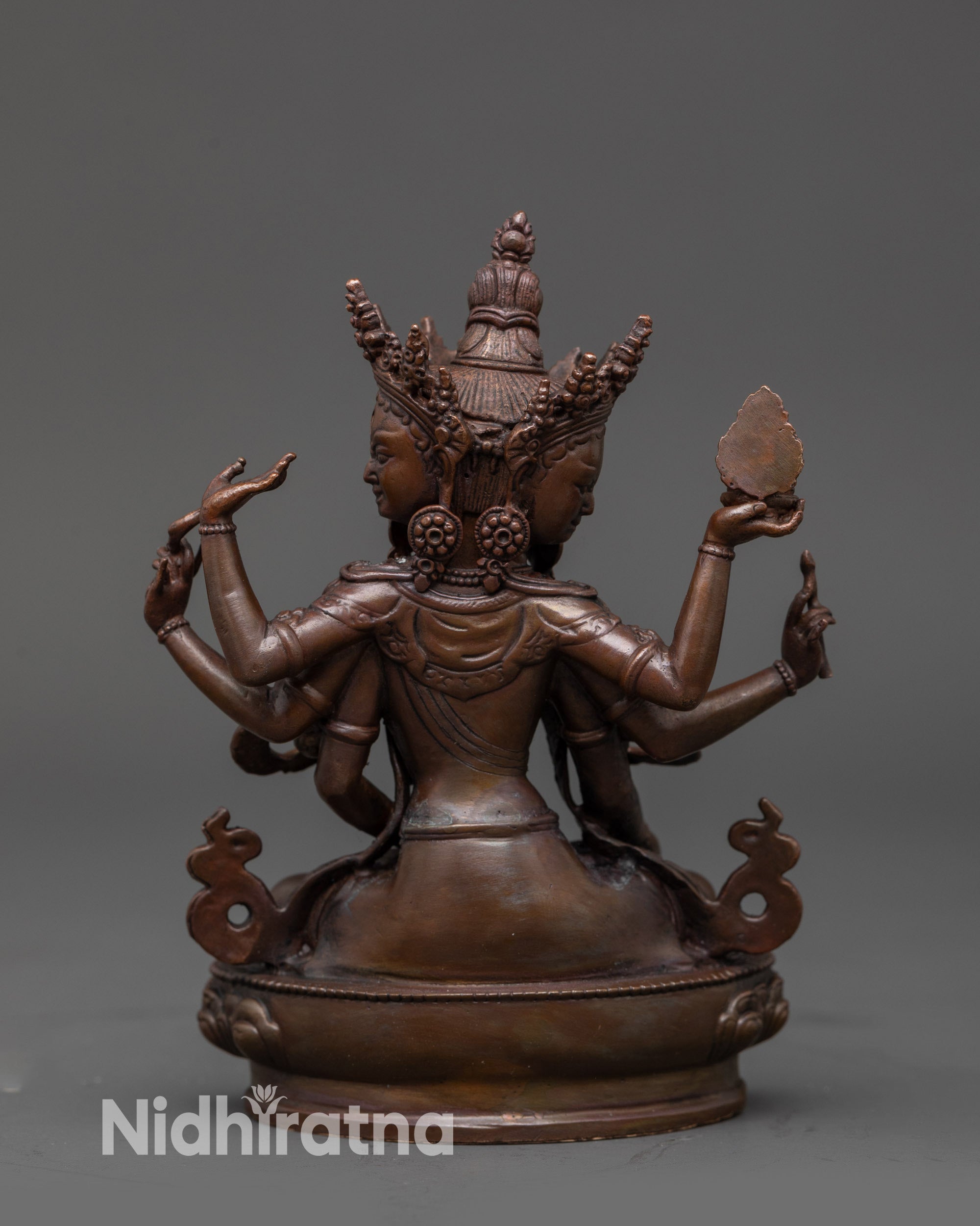 Sacred Namgyalma Oxidized Finish Statue displayed in serene altar setting radiating divine energy and protection