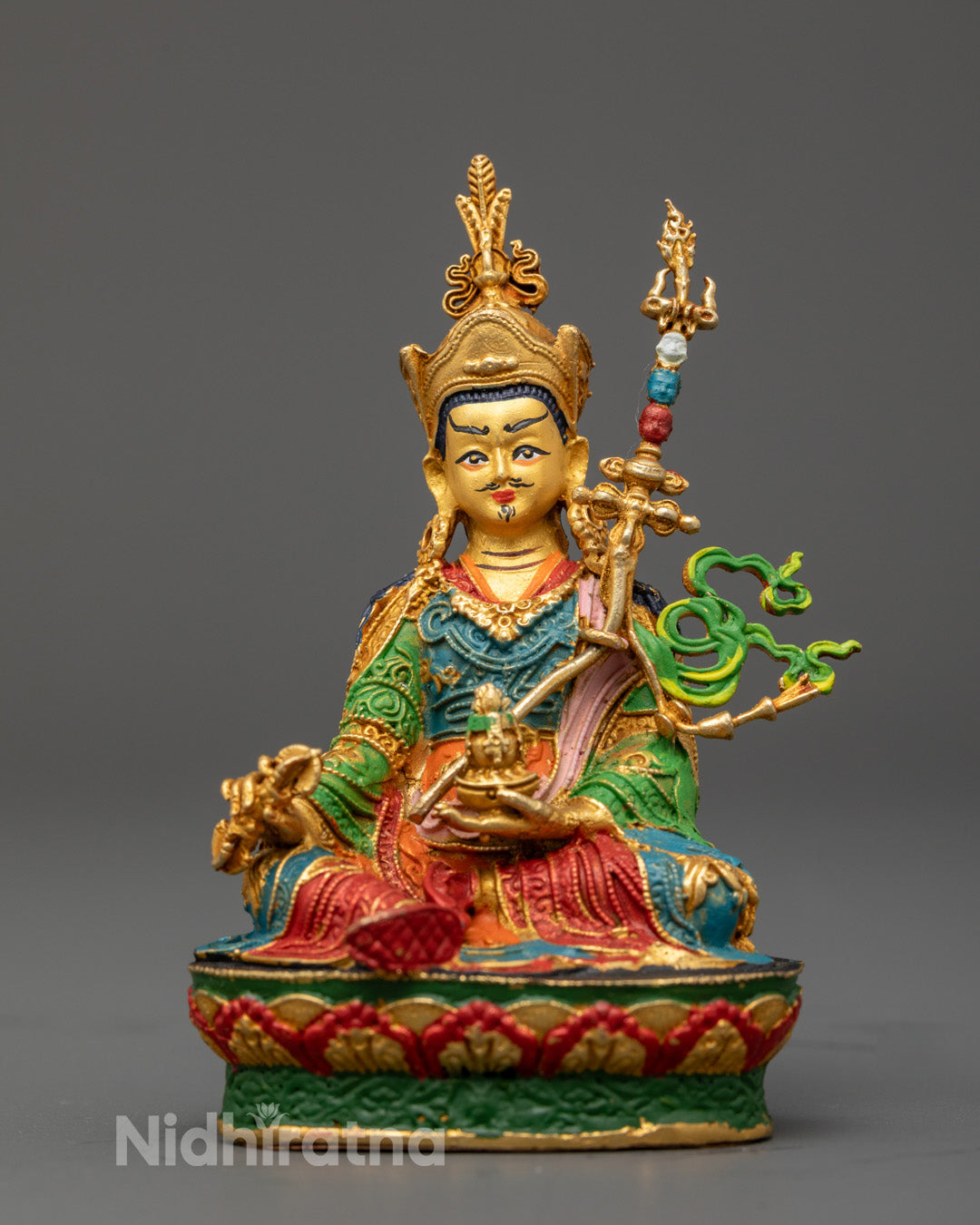 Sacred Padmasambhava Statue with gold-plated face, copper body, and colorful lotus throne – machine-made Tibetan Buddhist art
