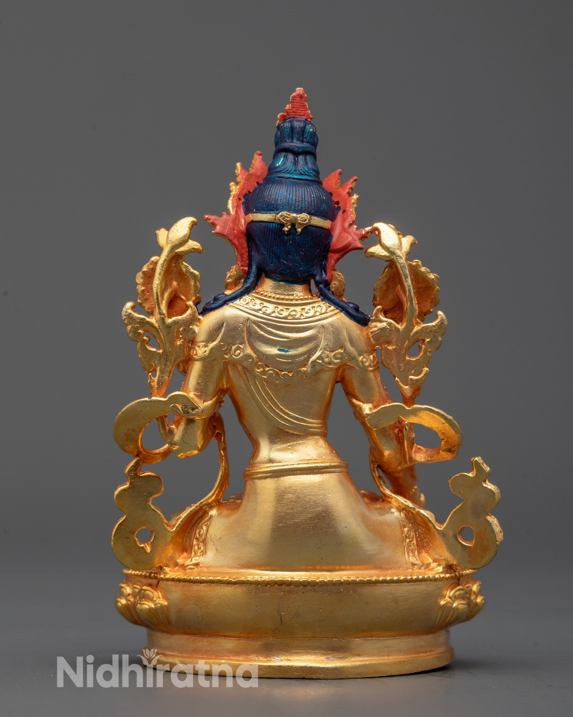Sacred White Tara statue with symbolic seven eyes and silver finish for Buddhist home shrine