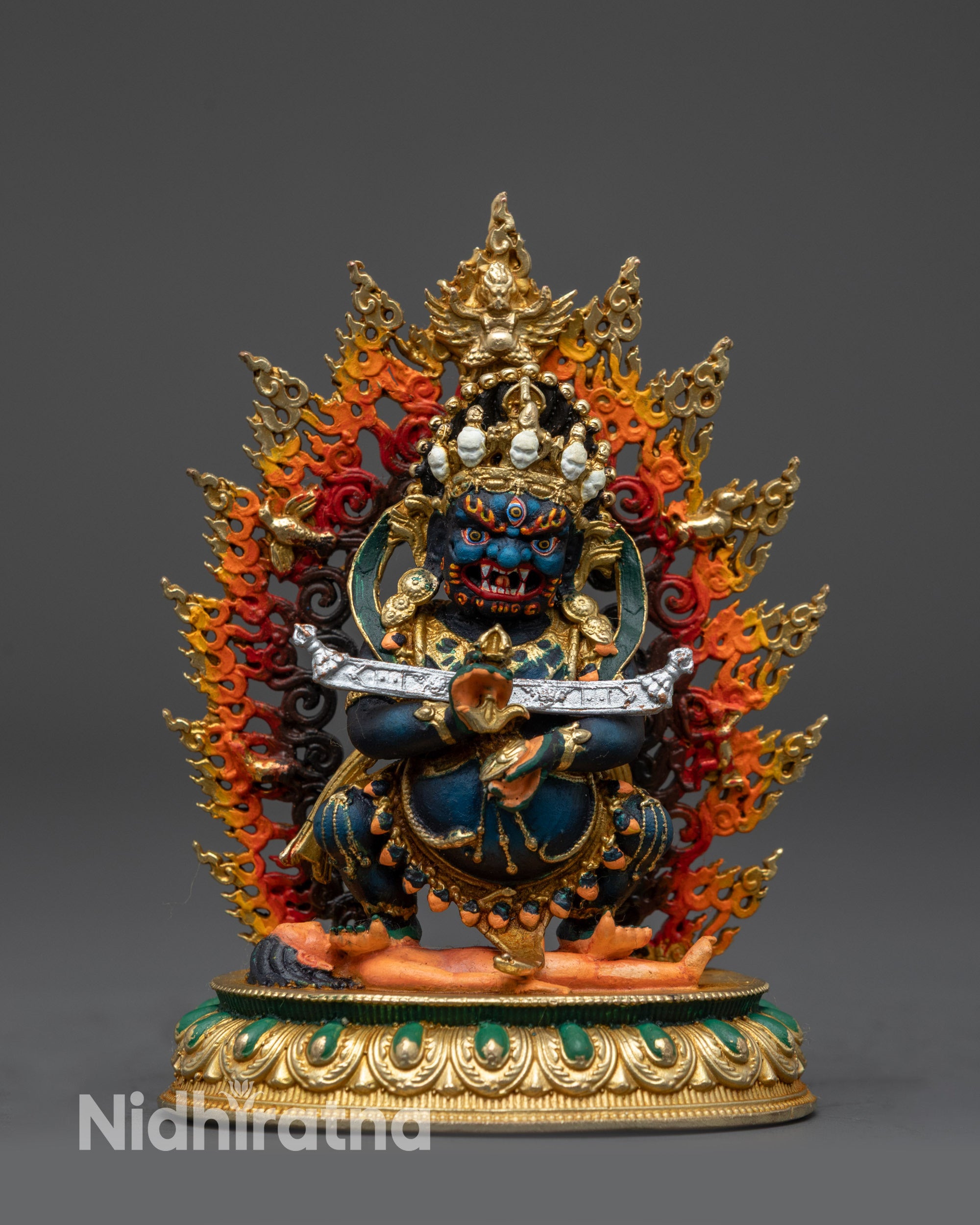 Sakya Mahakala statue standing on lotus seat with kartika and kapala