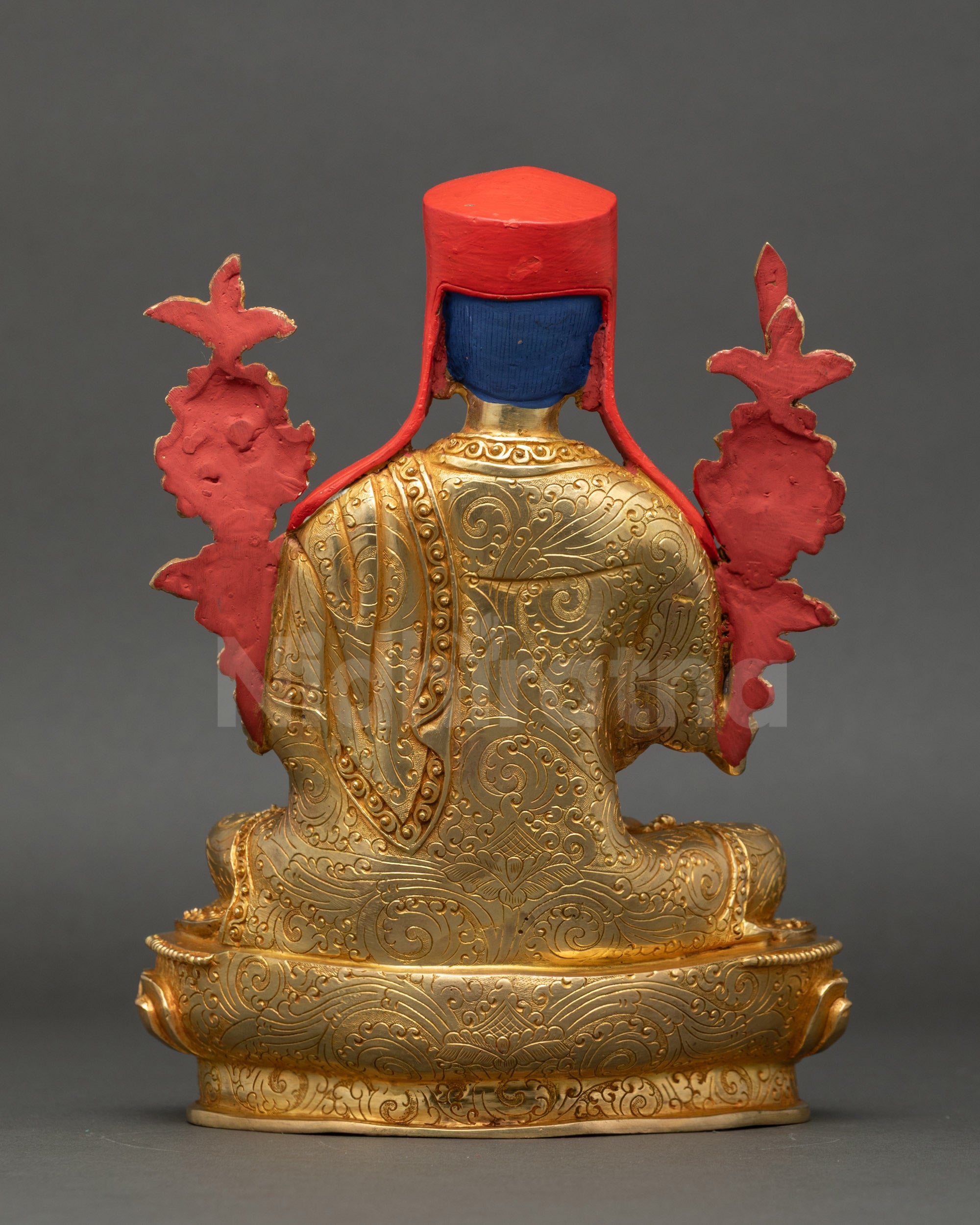 Sakya Pandita Statue back view showing detailed robe folds and Nepalese craftsmanship