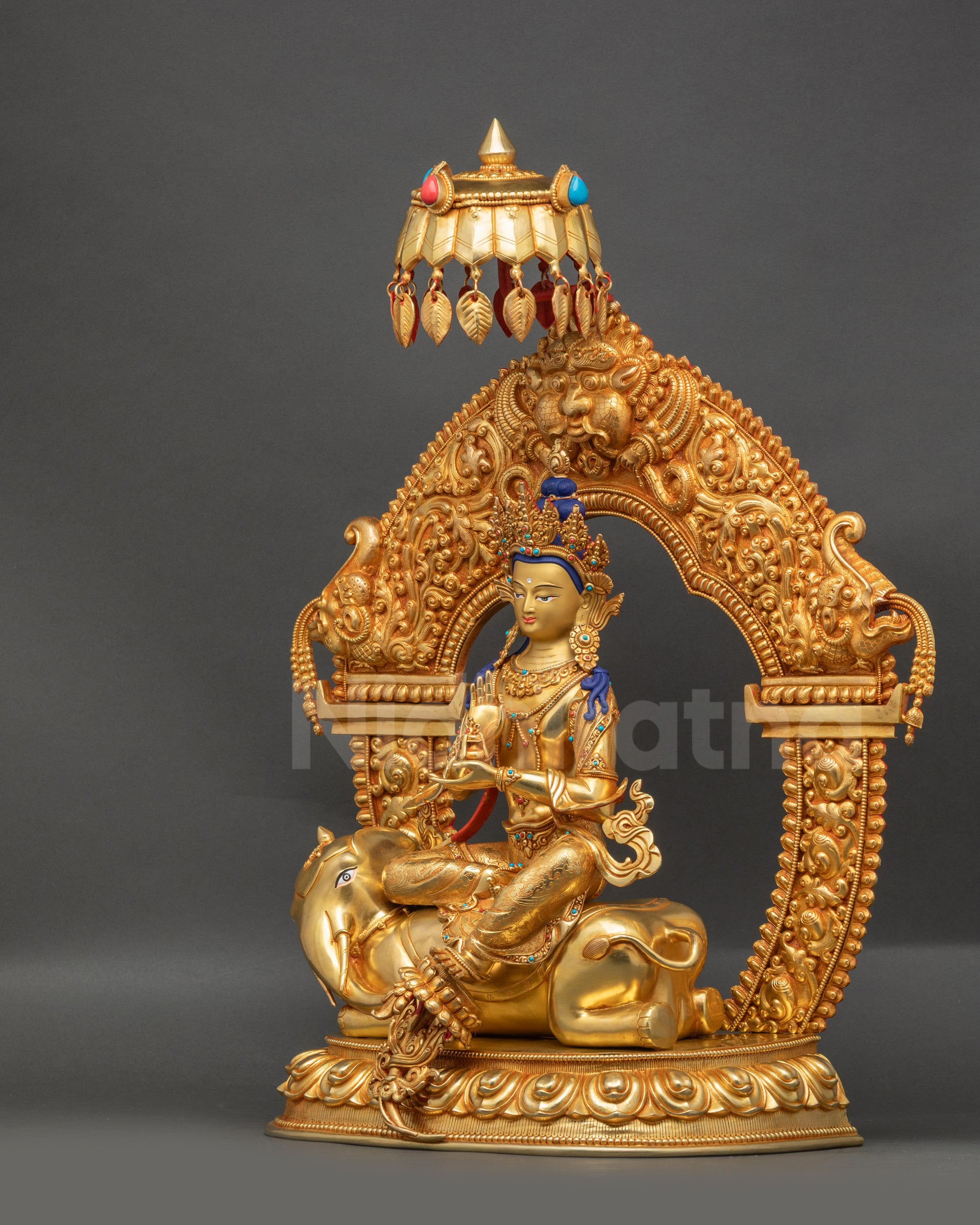 Samantabhadra statue left profile showing utpala flower and ornate garments