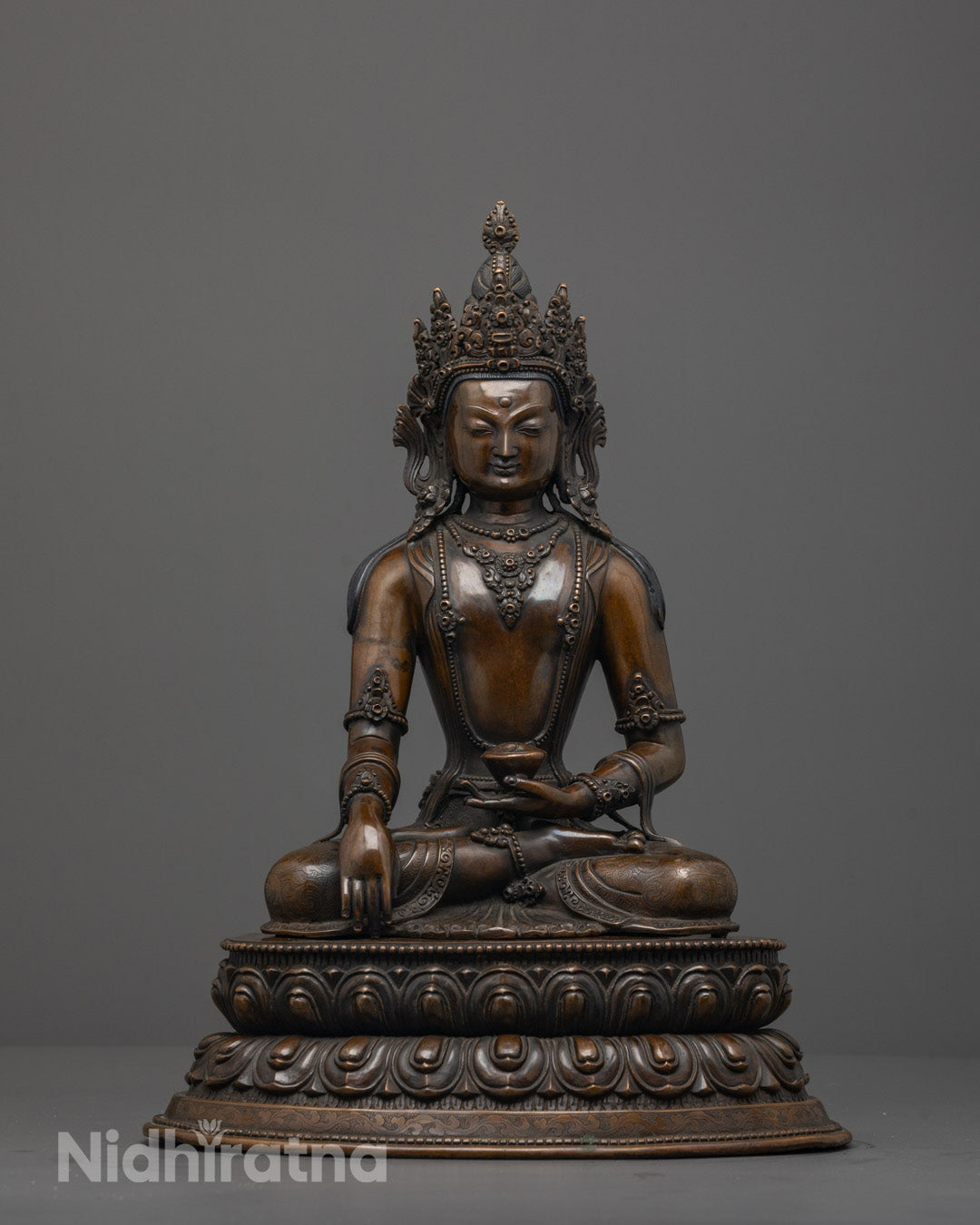 Front view of Traditional Jowo Shakyamuni Buddha Statue with oxidized copper finish