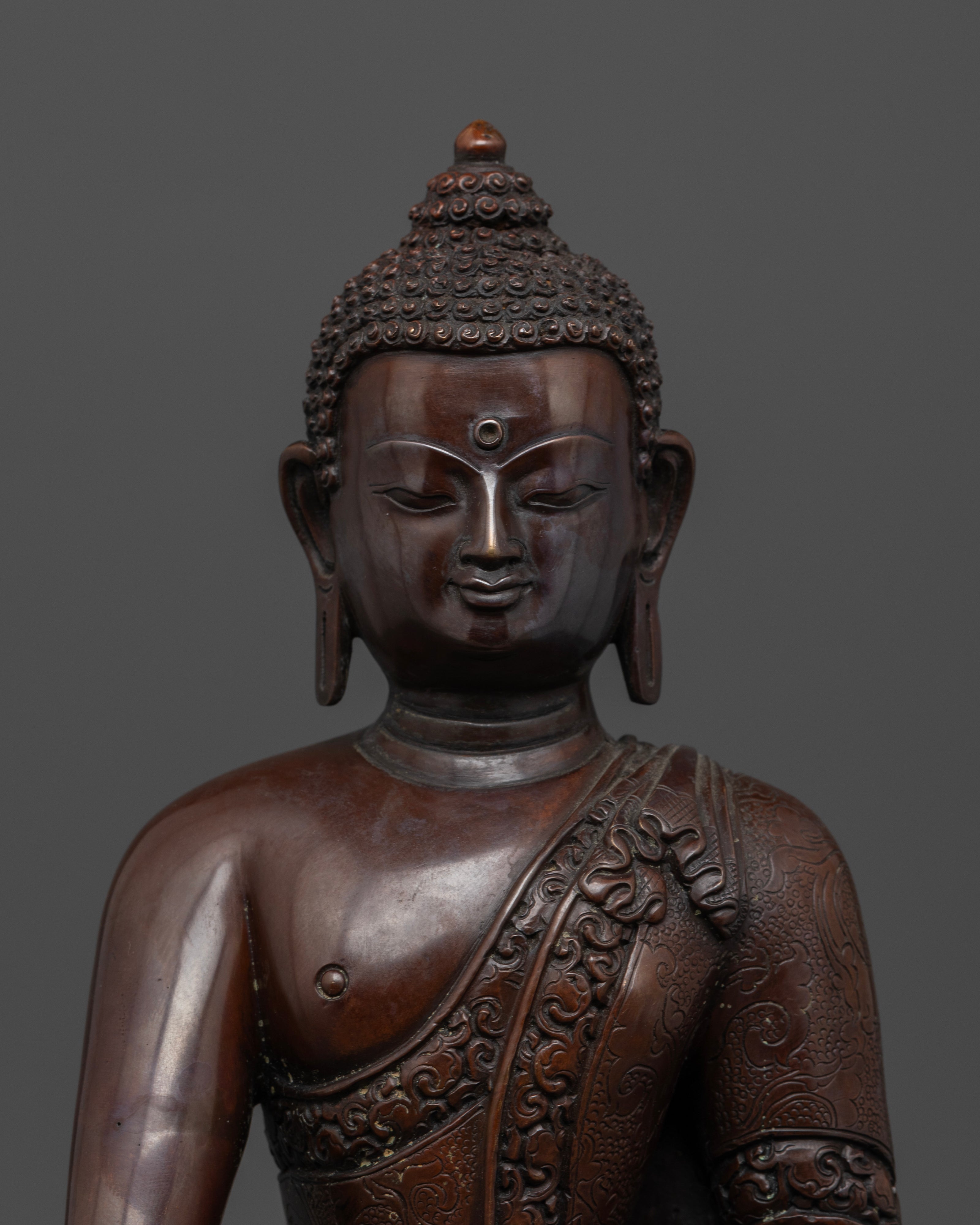 face of oxidized buddha statue