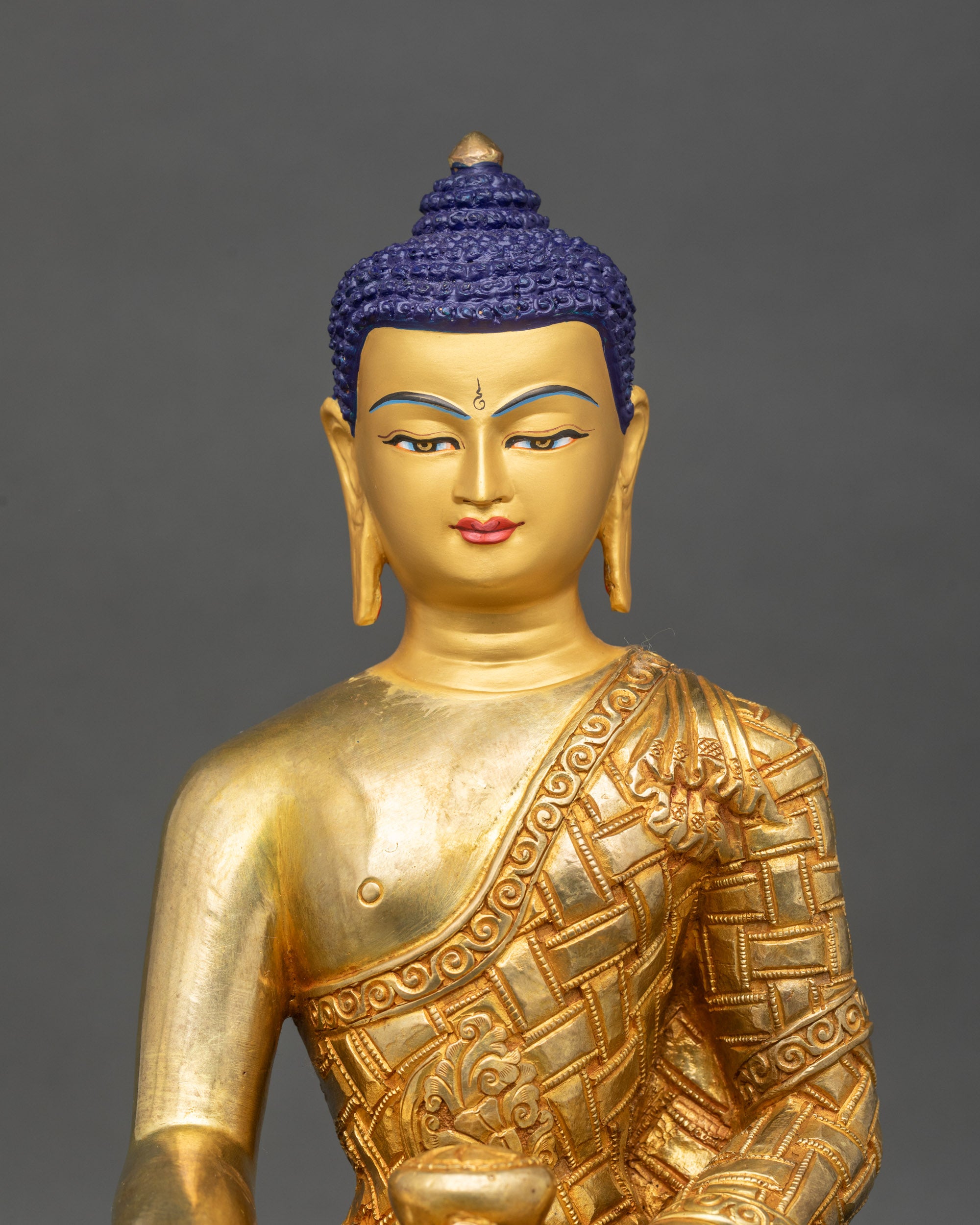 Fire-gilded Shakyamuni Buddha statue close-up, detailed Nepalese copper craftsmanship for meditation