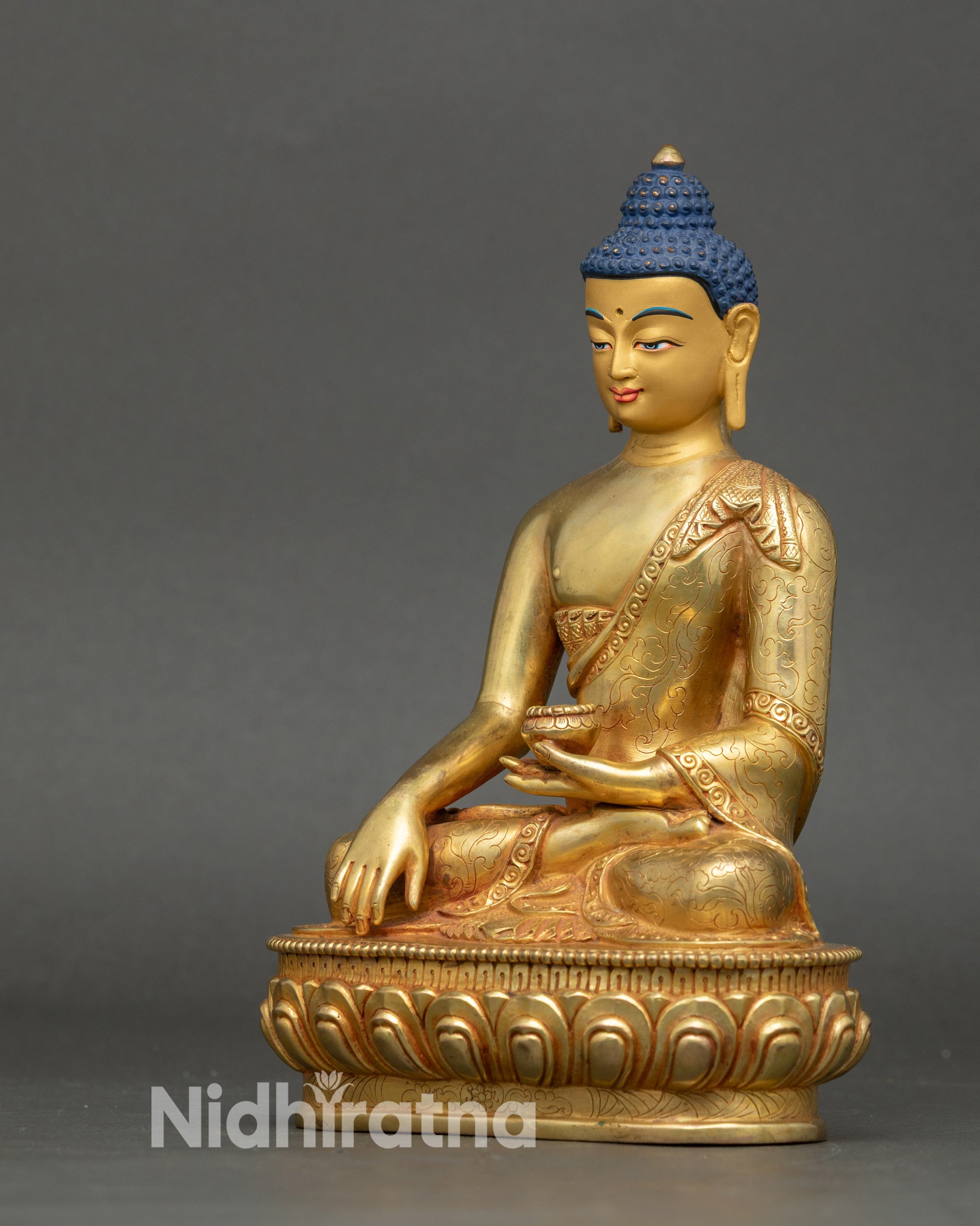 Shakyamuni Buddha earth touching mudra symbolizing enlightenment Tibetan art