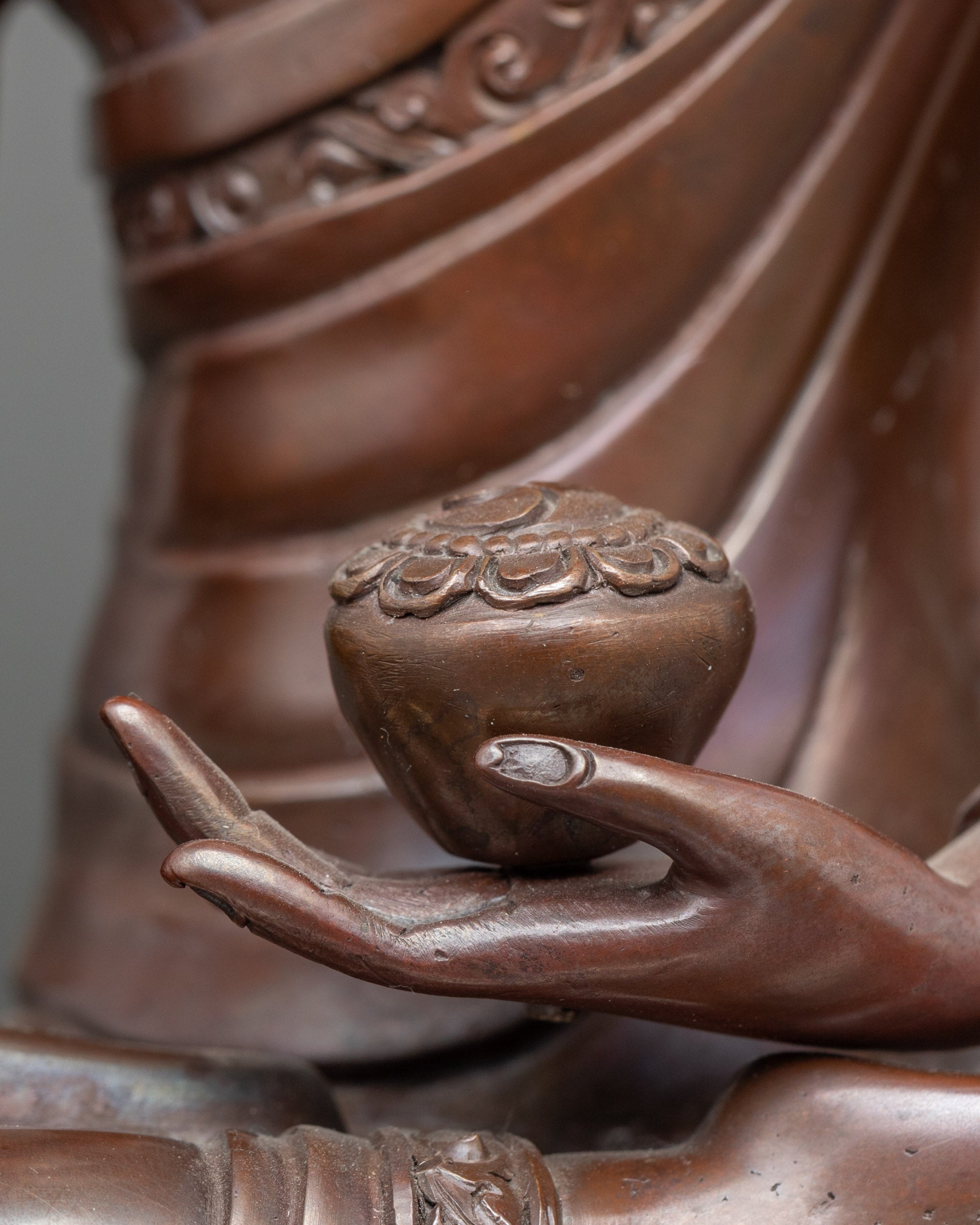 Shakyamuni Buddha holding monk’s alms bowl, Nepalese spiritual altar sculpture for devotion