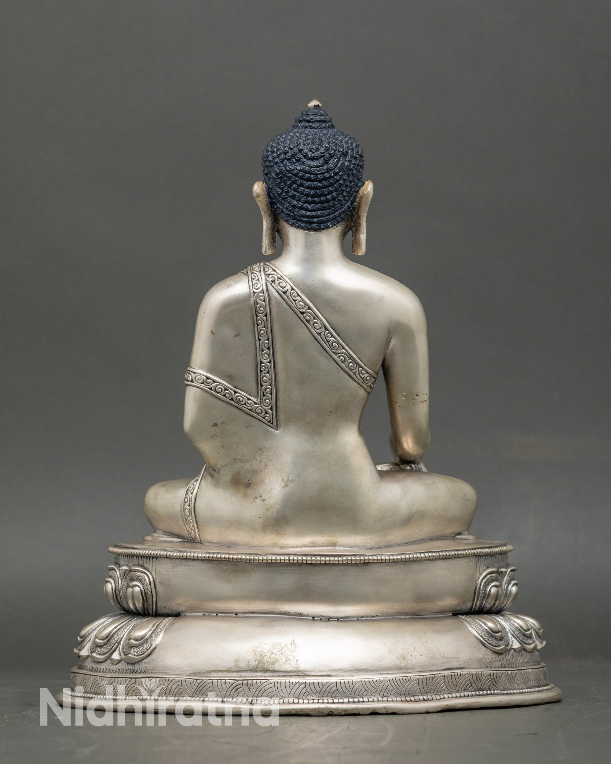 Shakyamuni Buddha holding monk’s bowl, gold-finished copper for meditation