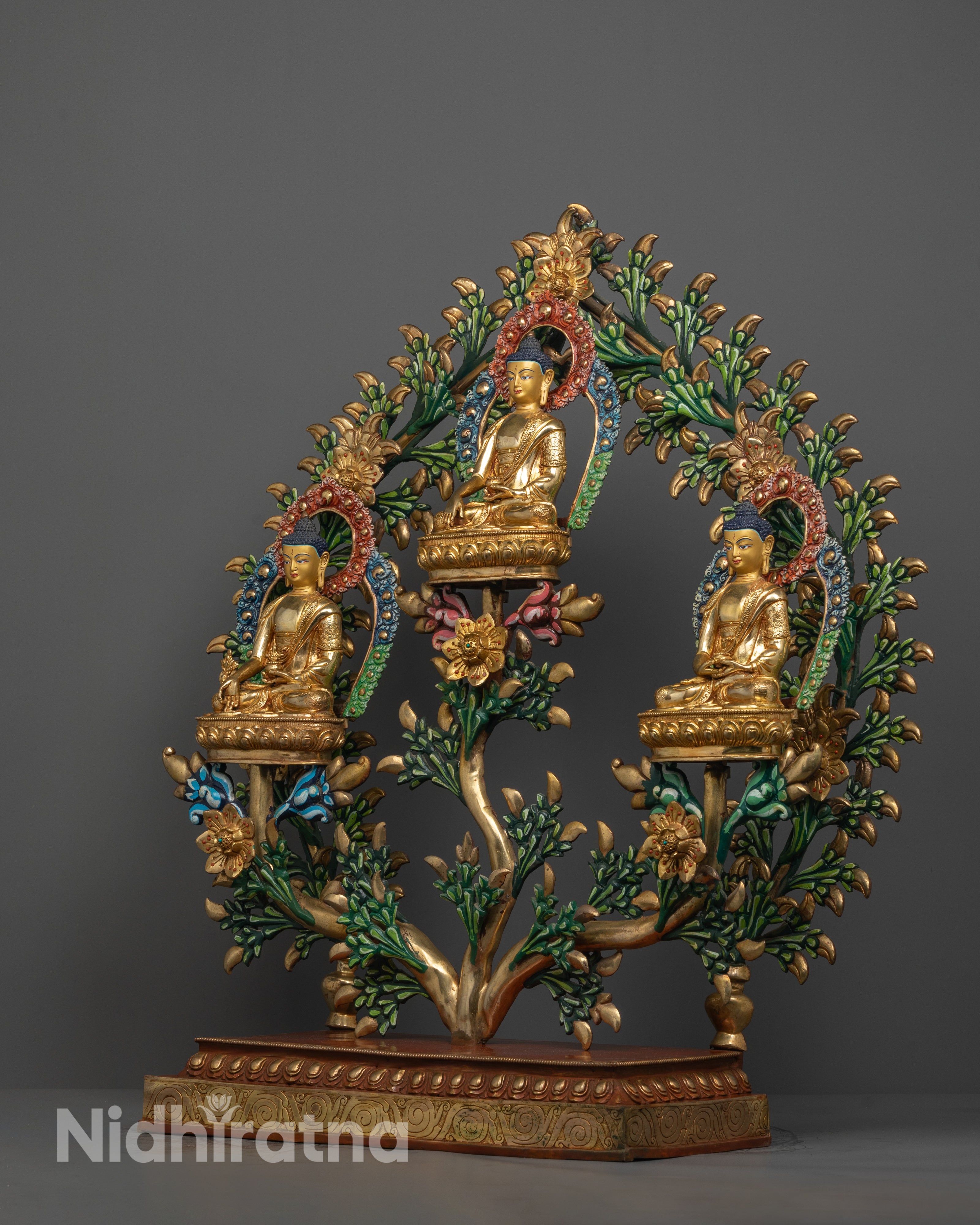 Shakyamuni Buddha’s face and hands showing calm expression and intricate gold detailing