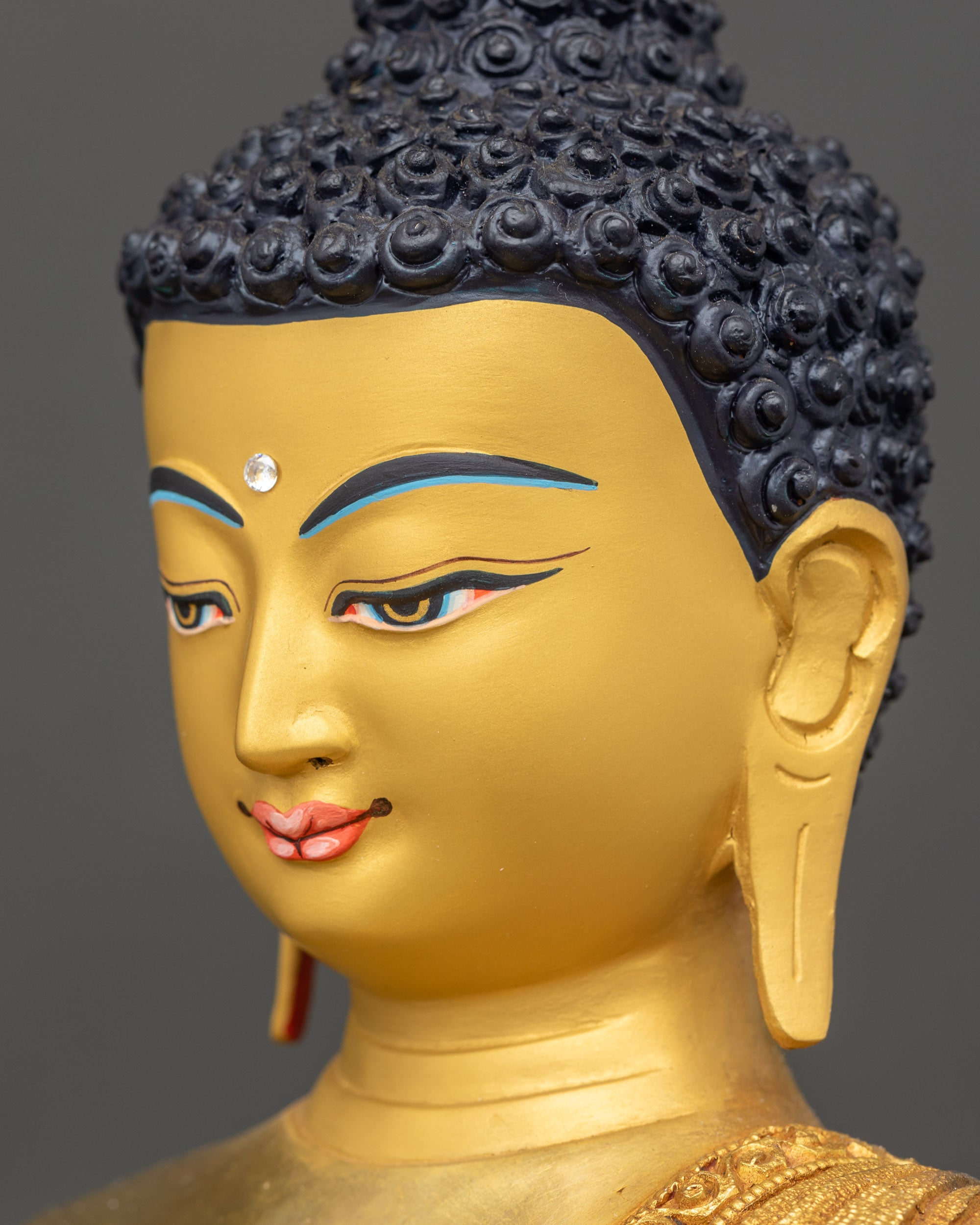 Shakyamuni Buddha side face close up gold-gilded copper craftsmanship