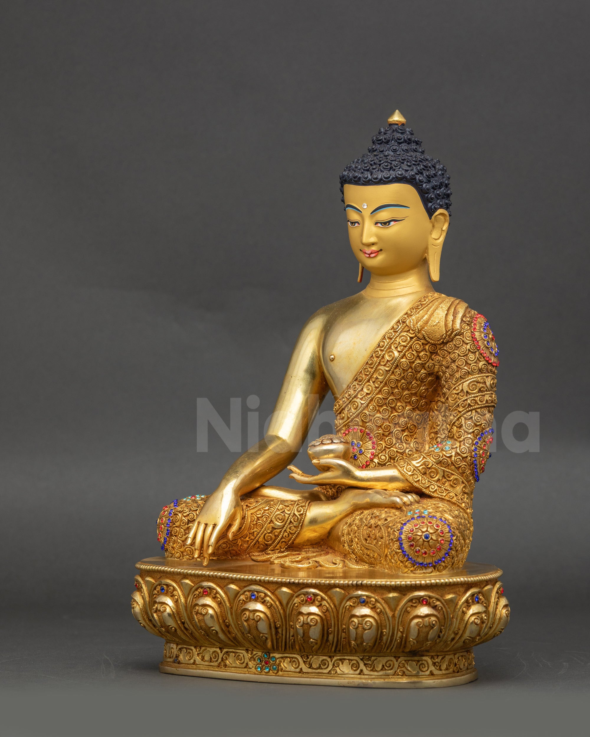 Siddhartha Gautama Buddha left side view hand-patterned robes copper