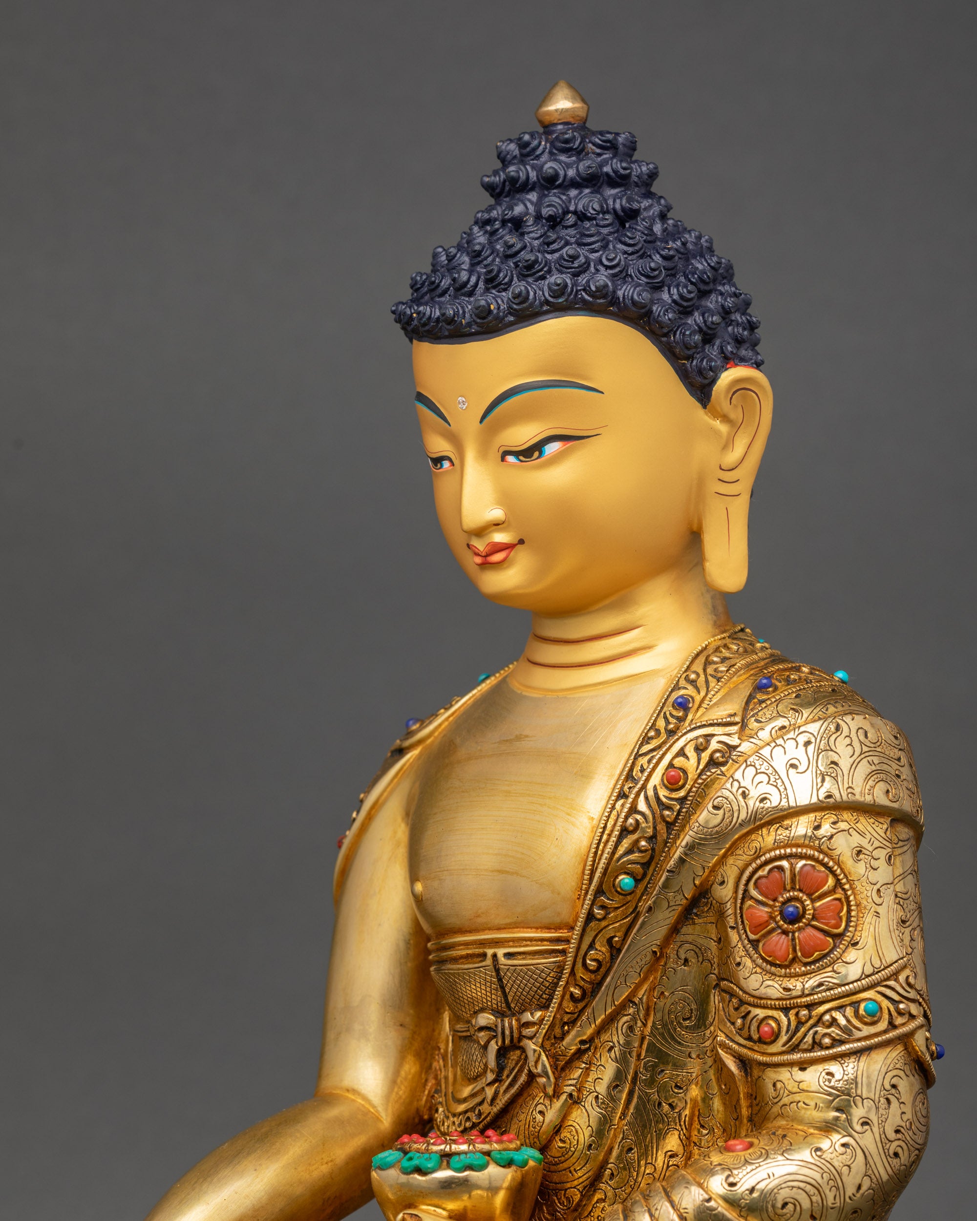 Siddhartha Gautama Buddha statue side close up 3D carvings Nepal