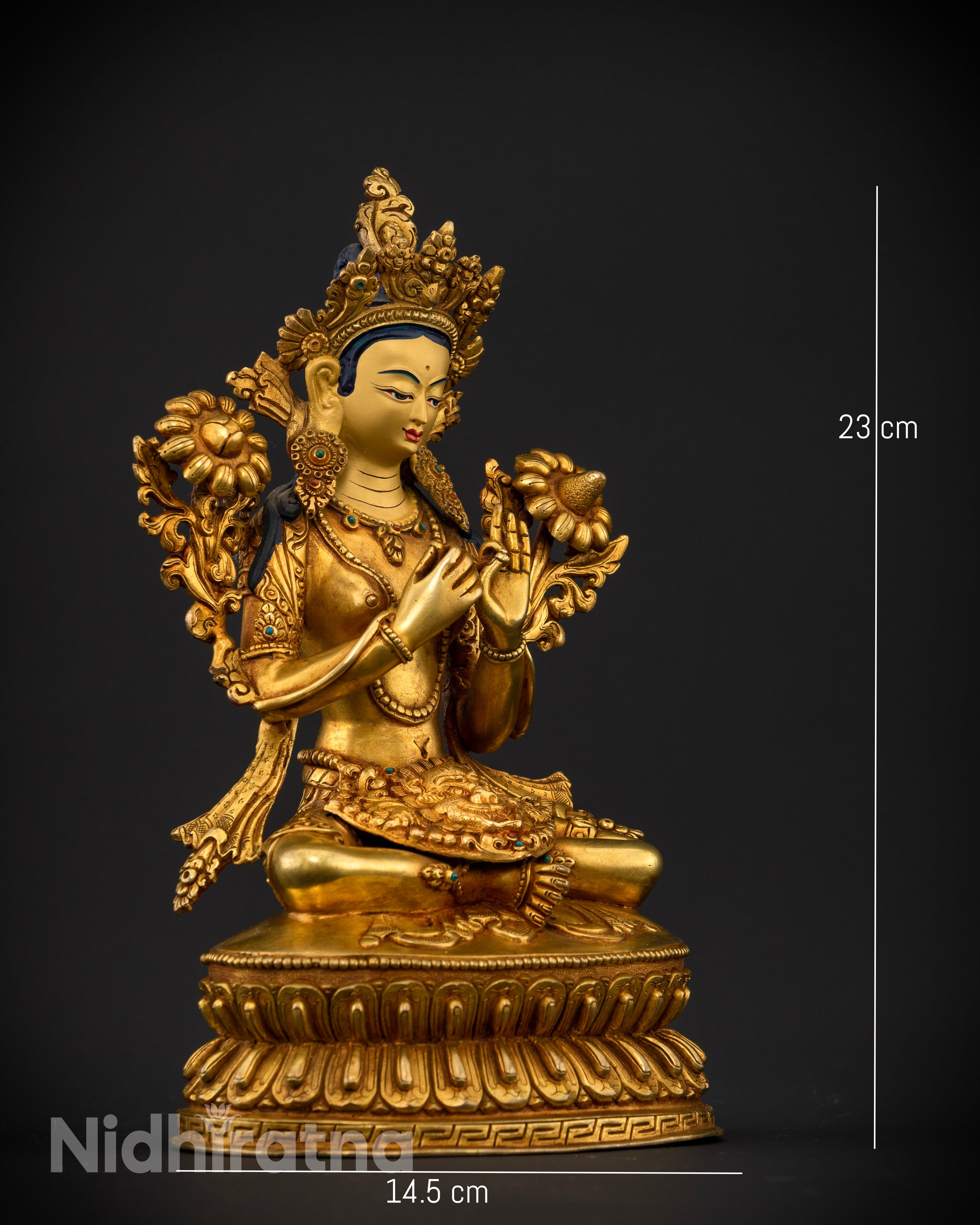 Side view of Green Tara statue lalitasana posture right leg extended spiritual home altar decor