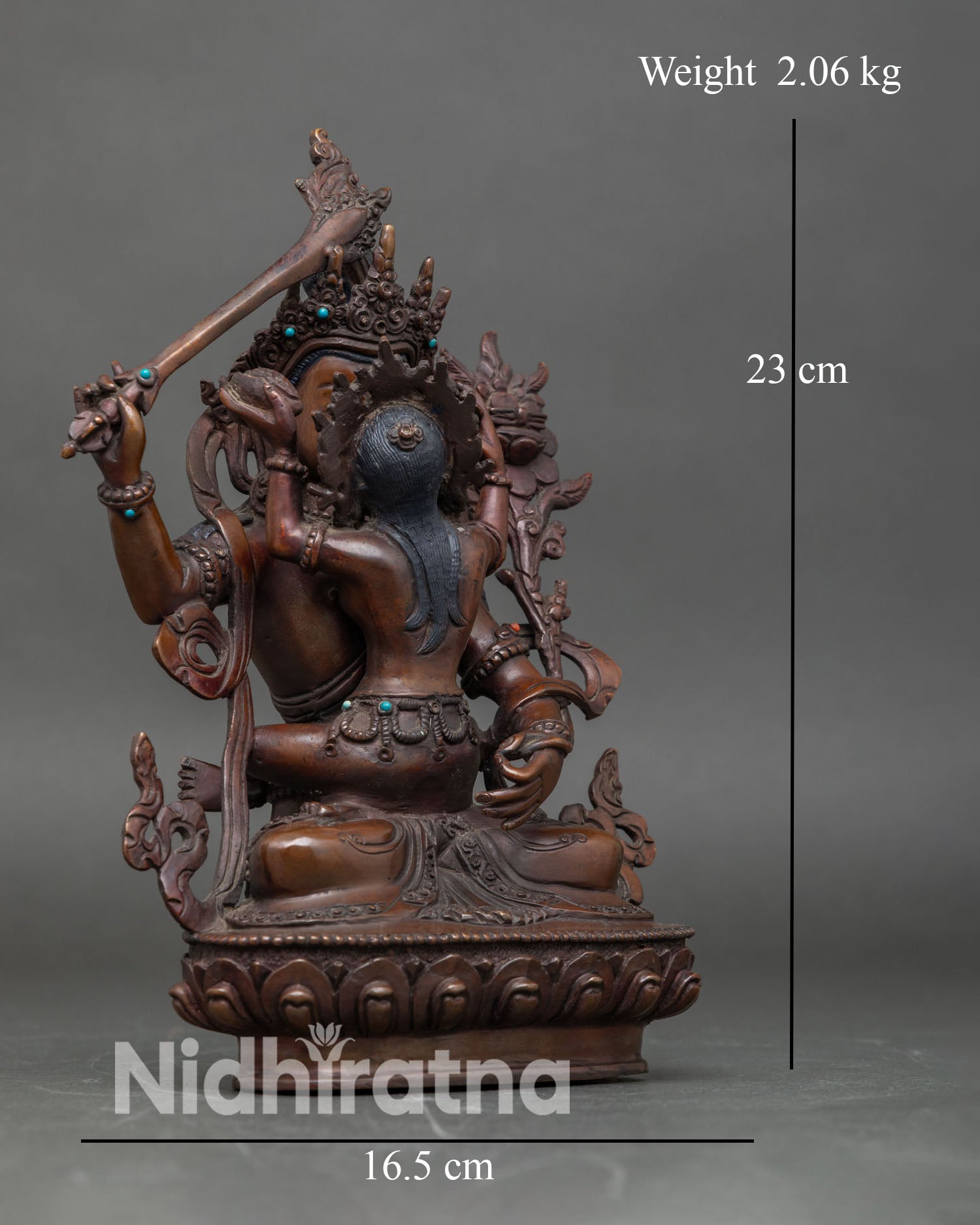 Side view of Manjushri with Consort Statue lotus pedestal oxidized copper spiritual decor