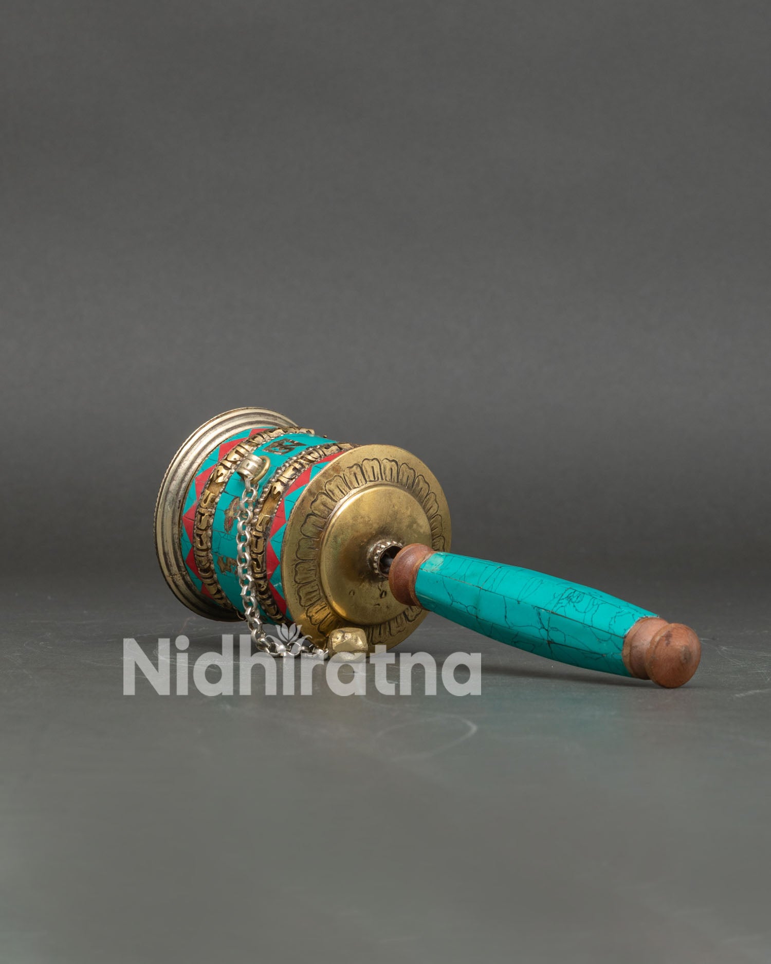 Side view Tibetan Handheld Mantra Wheel handle counterweight spins smoothly