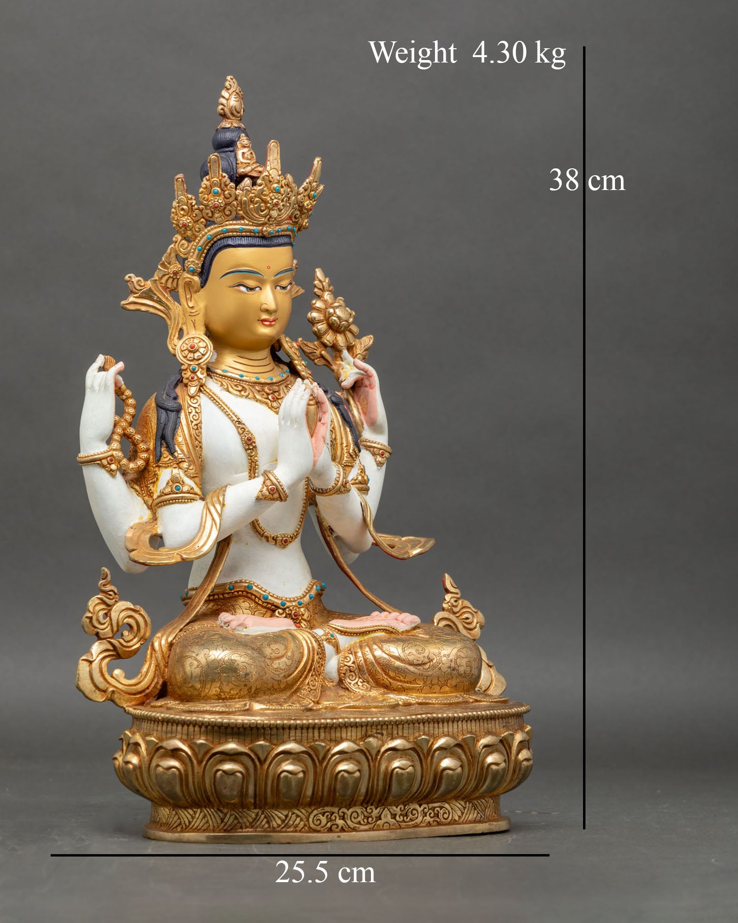 Side view of Avalokiteshvara statue with hand-painted-acrylic details and semi-precious-stones