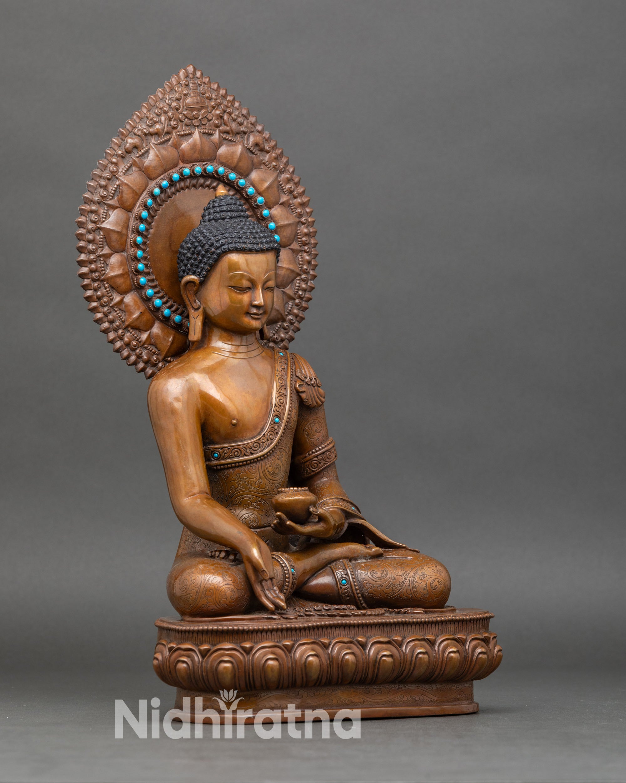 Side view of Tibetan Ratnasambhava statue, Newari artisan handmade, symbolic posture