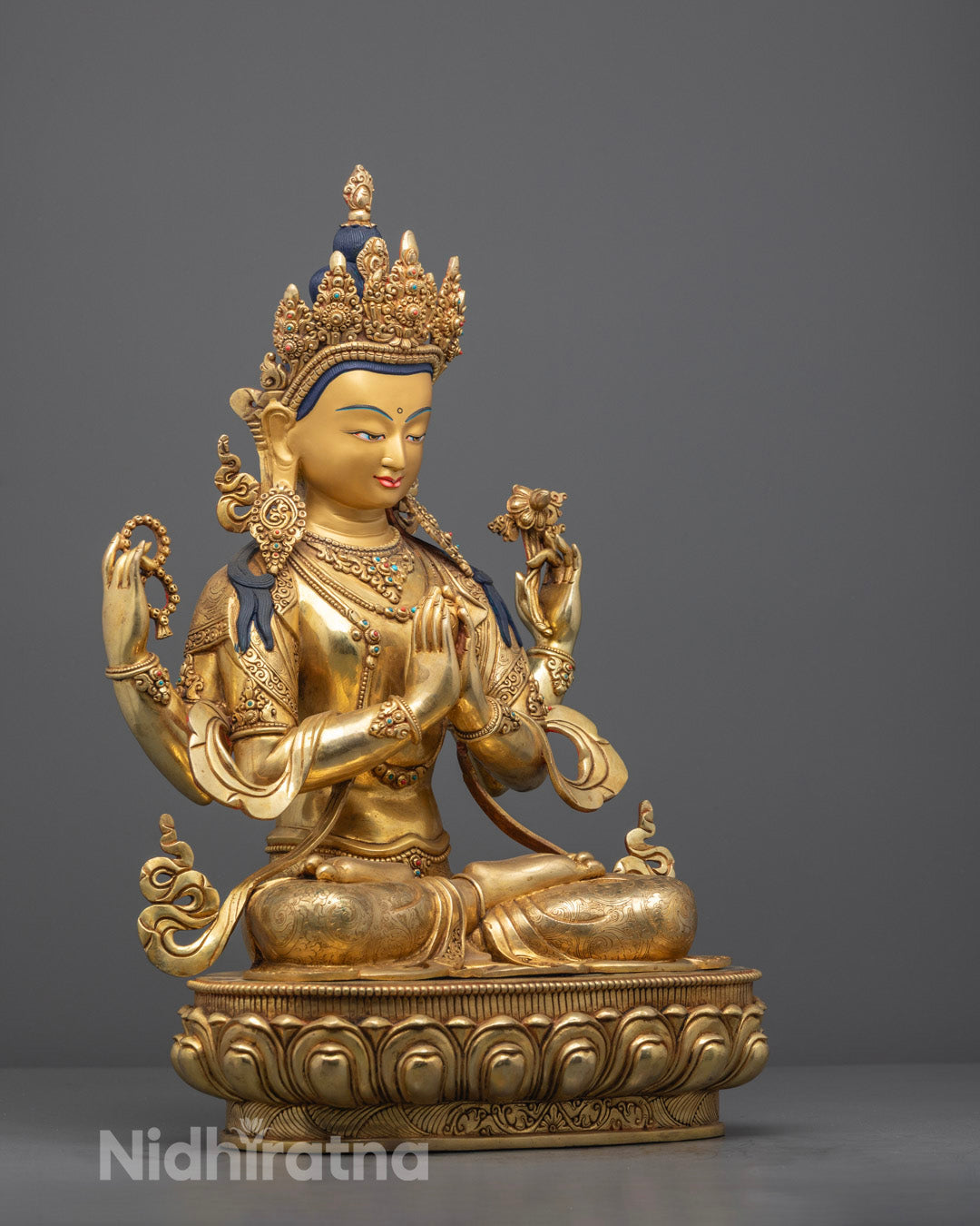 Chenrezig Statue Displaying Intricate Carvings and Detailed Lotus Base – Traditional Nepalese Craftsmanship