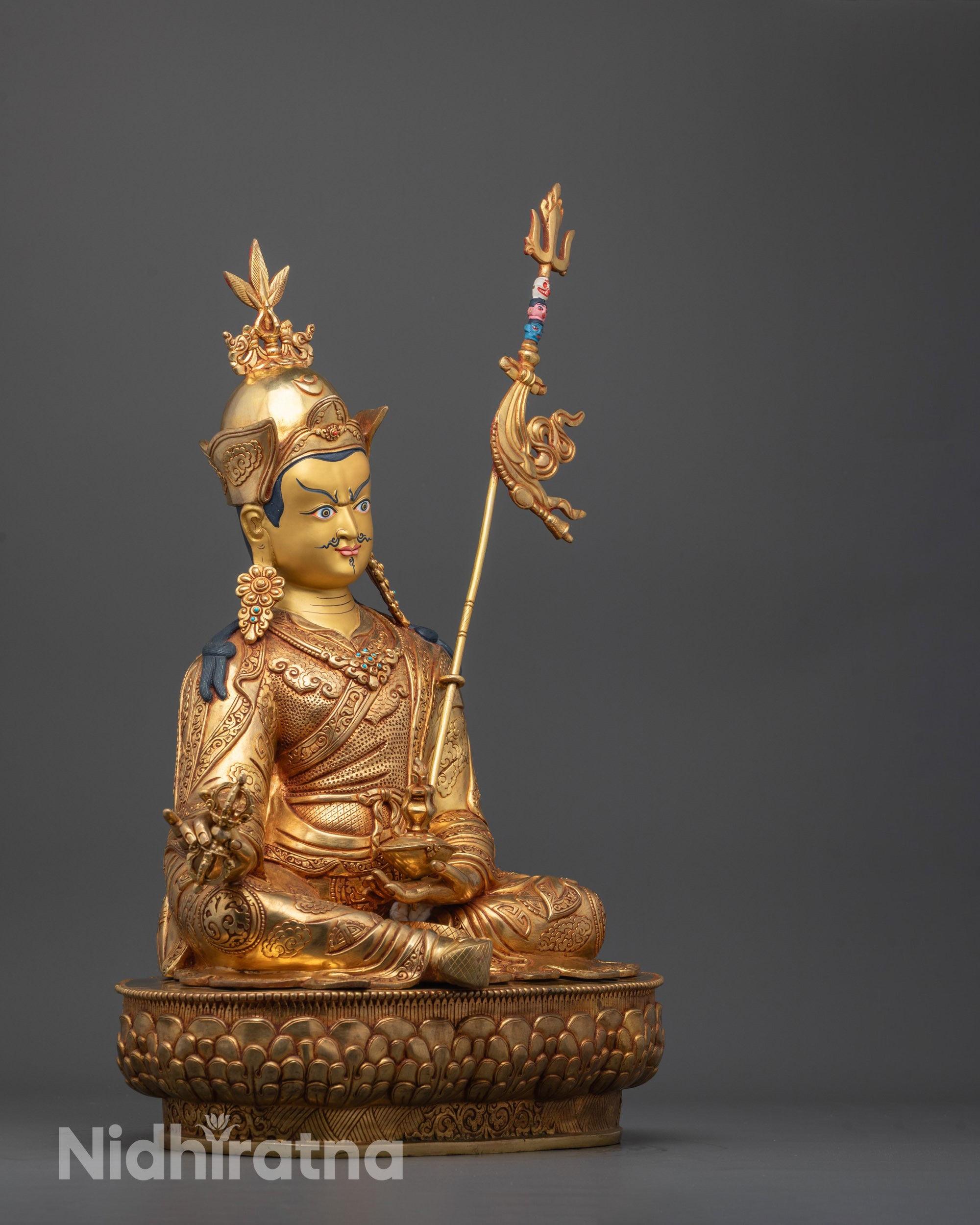 Side Angle of Fire-Gilded Padmasambhava Statue Showing Intricate Robe Details