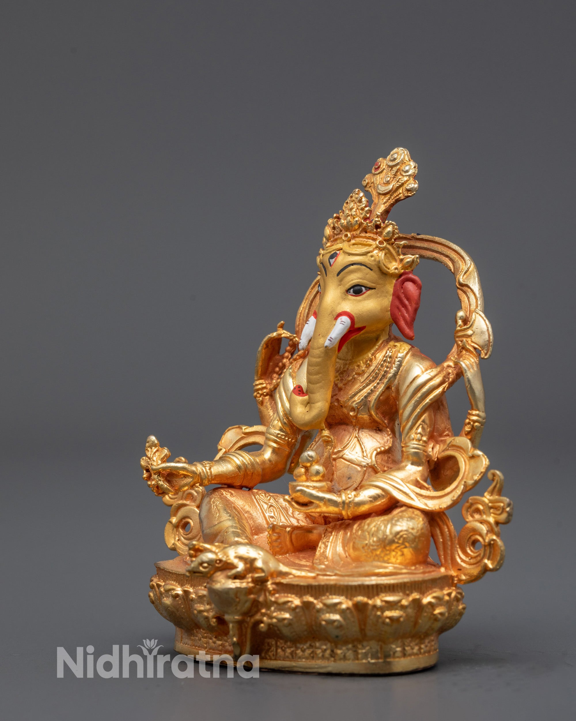 Side Angle of Gold-Plated Ganesha Idol Showing Intricate Craftsmanship
