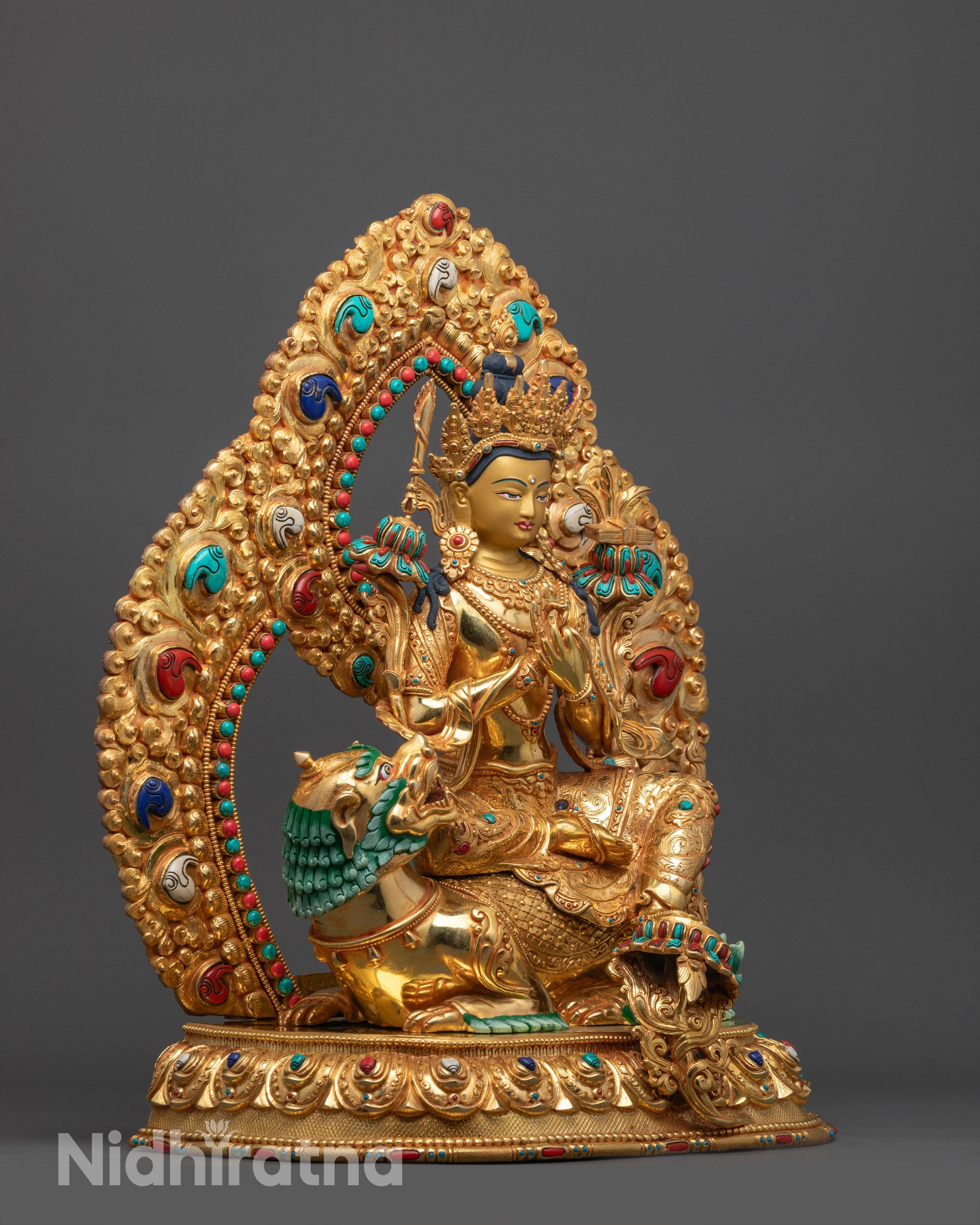 Side Angle of Manjushri Statue Showing Lost Wax Carving and Sword of Wisdom