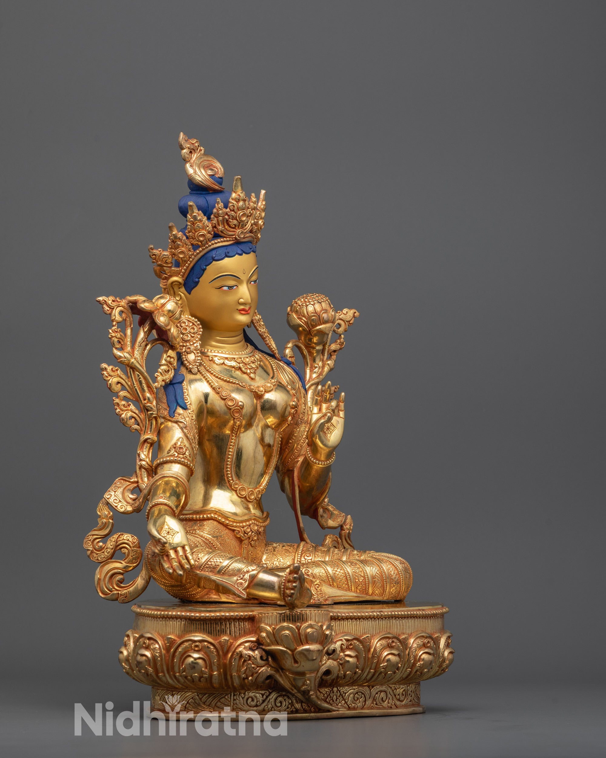 Side Angle of Traditional Green Tara Sculpture Seated in Varada Mudra Posture