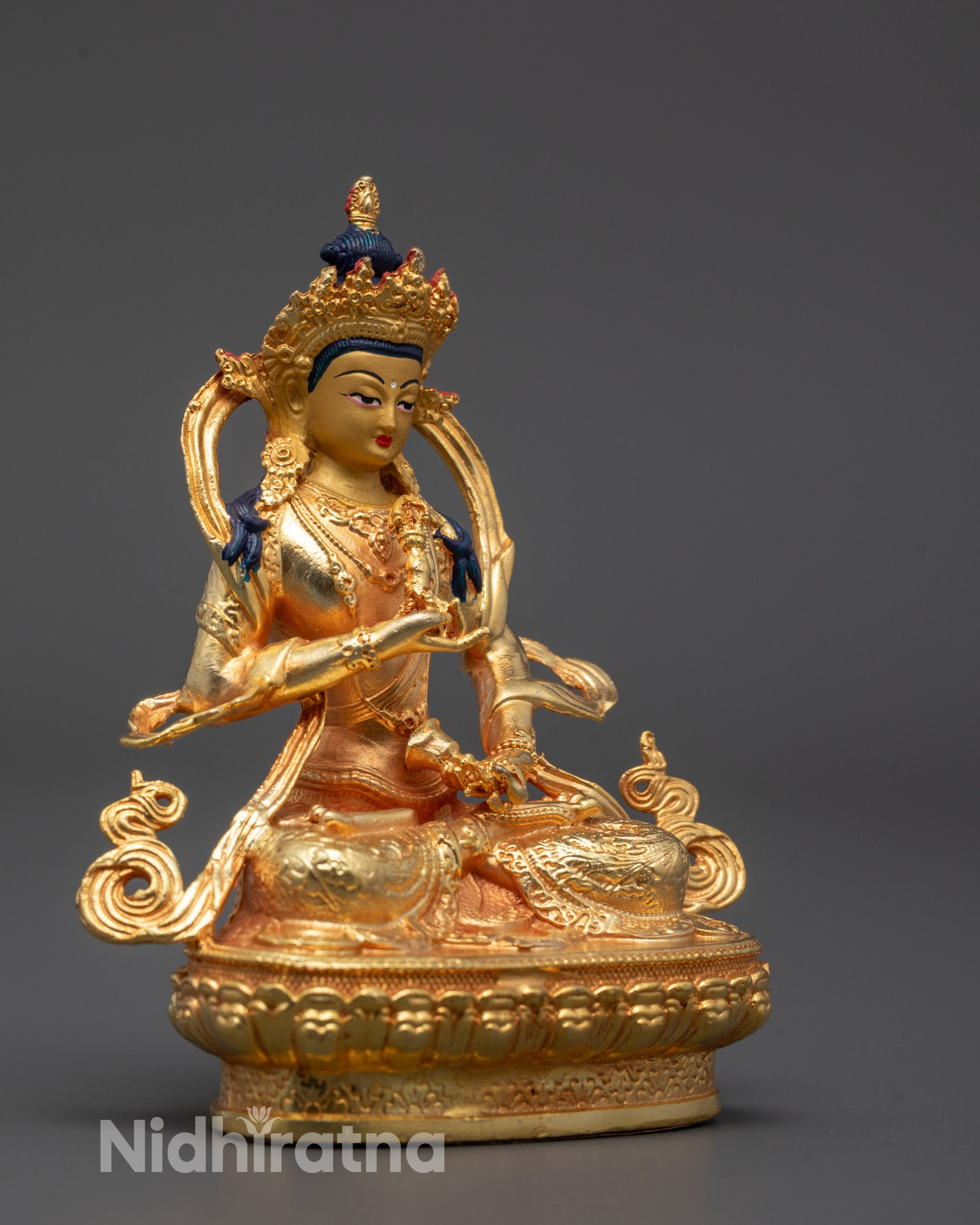 Side angle of 24k gold-plated Vajrasattva sculpture showing copper body