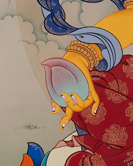 Side angle of Dzambhala Thangka highlighting citron fruit and ornate lotus seat details