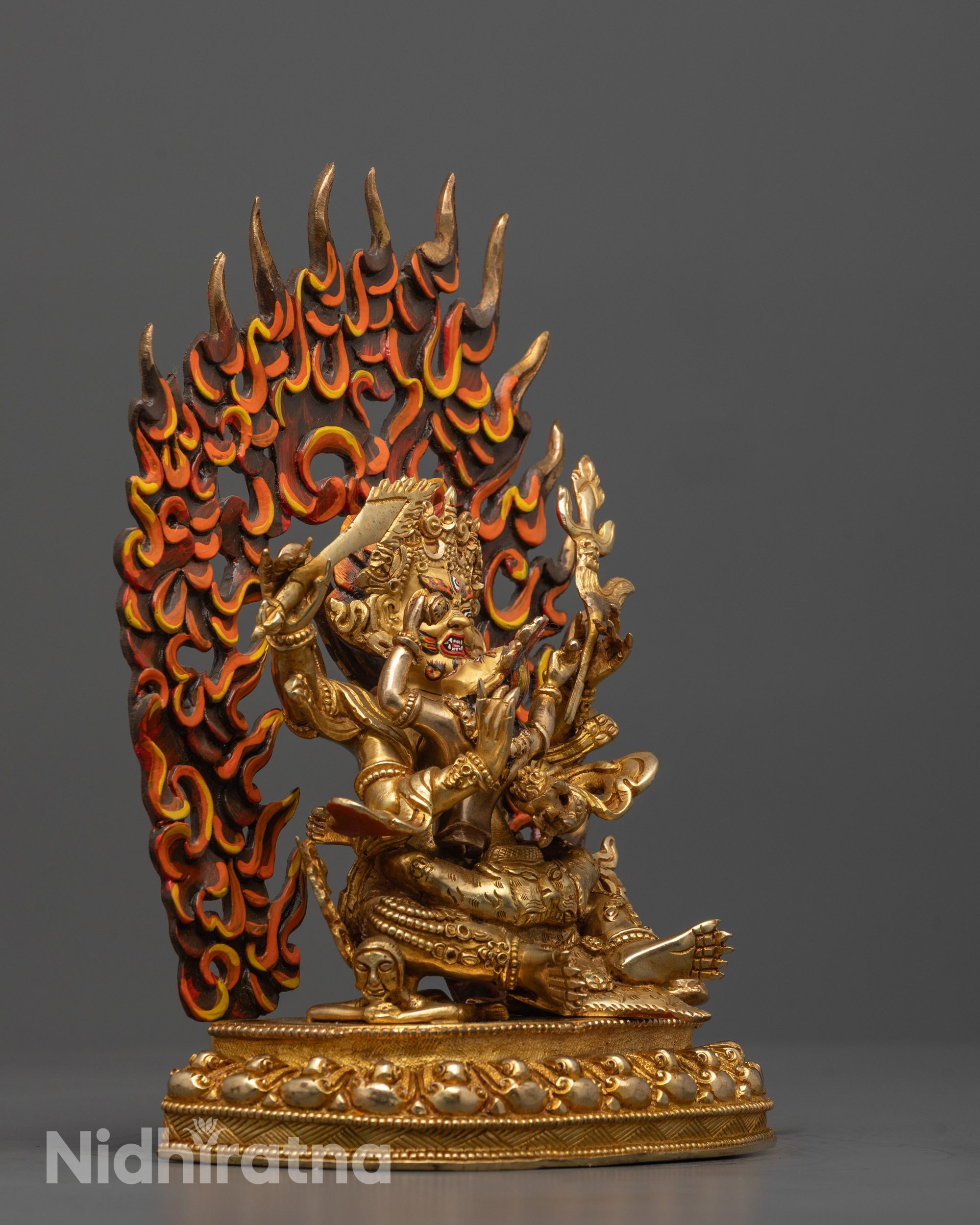 Side angle of Four Armed Mahakala Consort Statue showcasing intricate acrylic colors