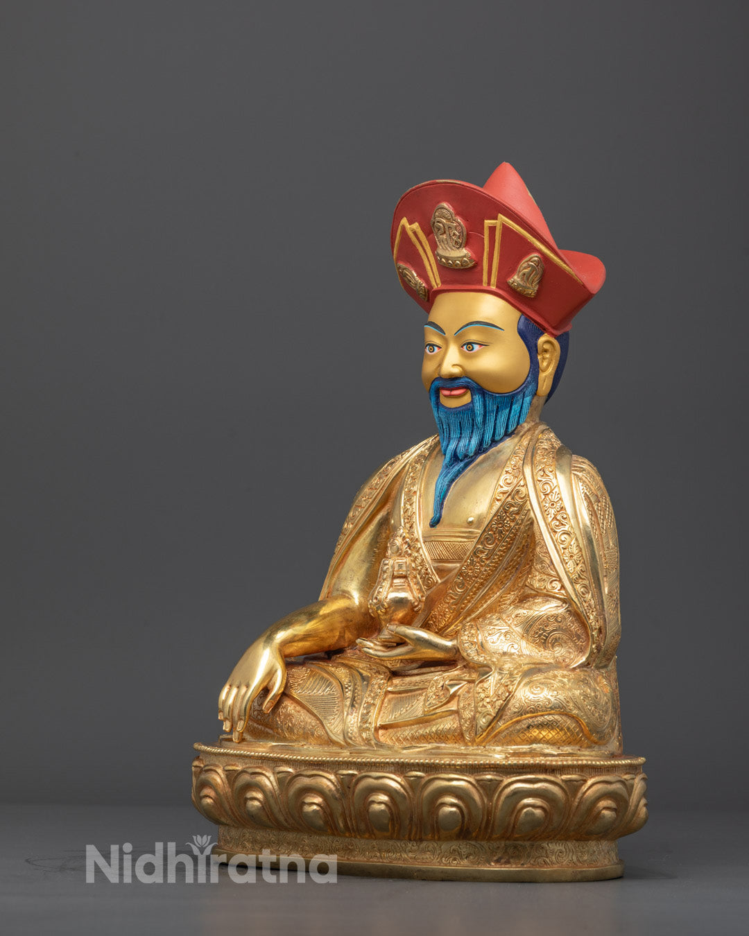 Side angle of Guru Shapdum statue showing holy vase and detailed carvings
