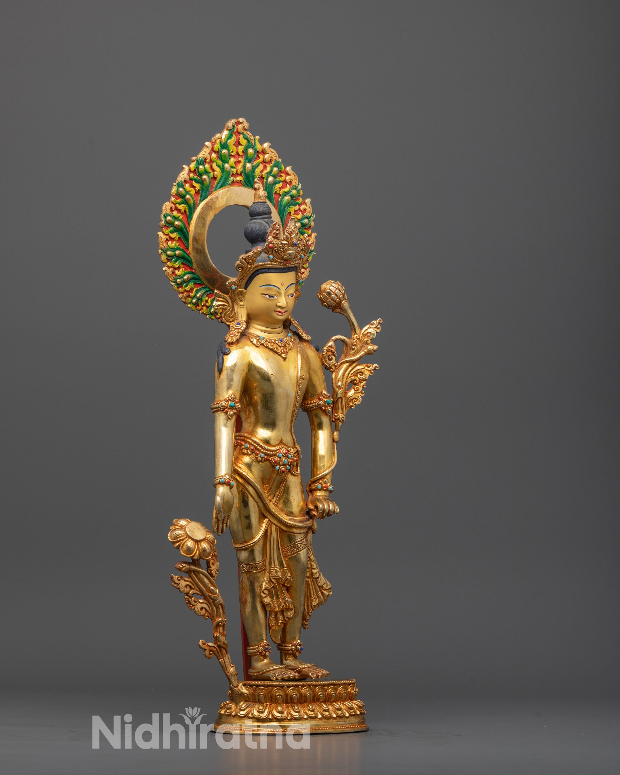 Side angle of Padmapani Statue showing intricate lotus pedestal